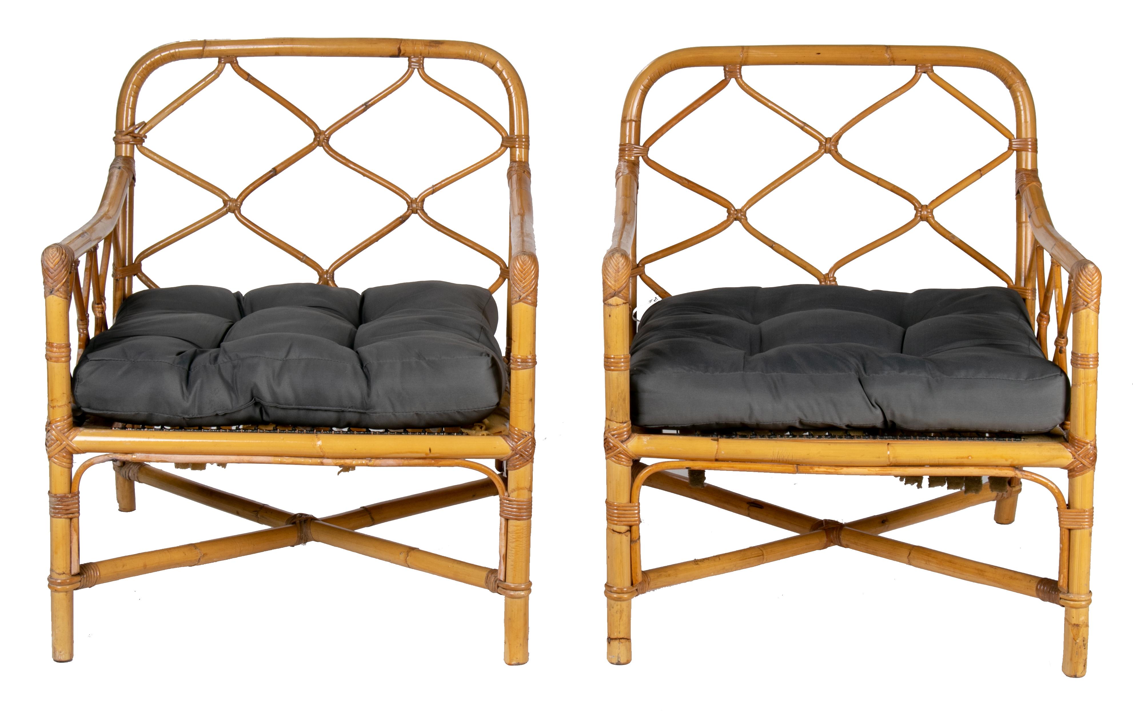 1980s pair of bamboo and canework armchairs.