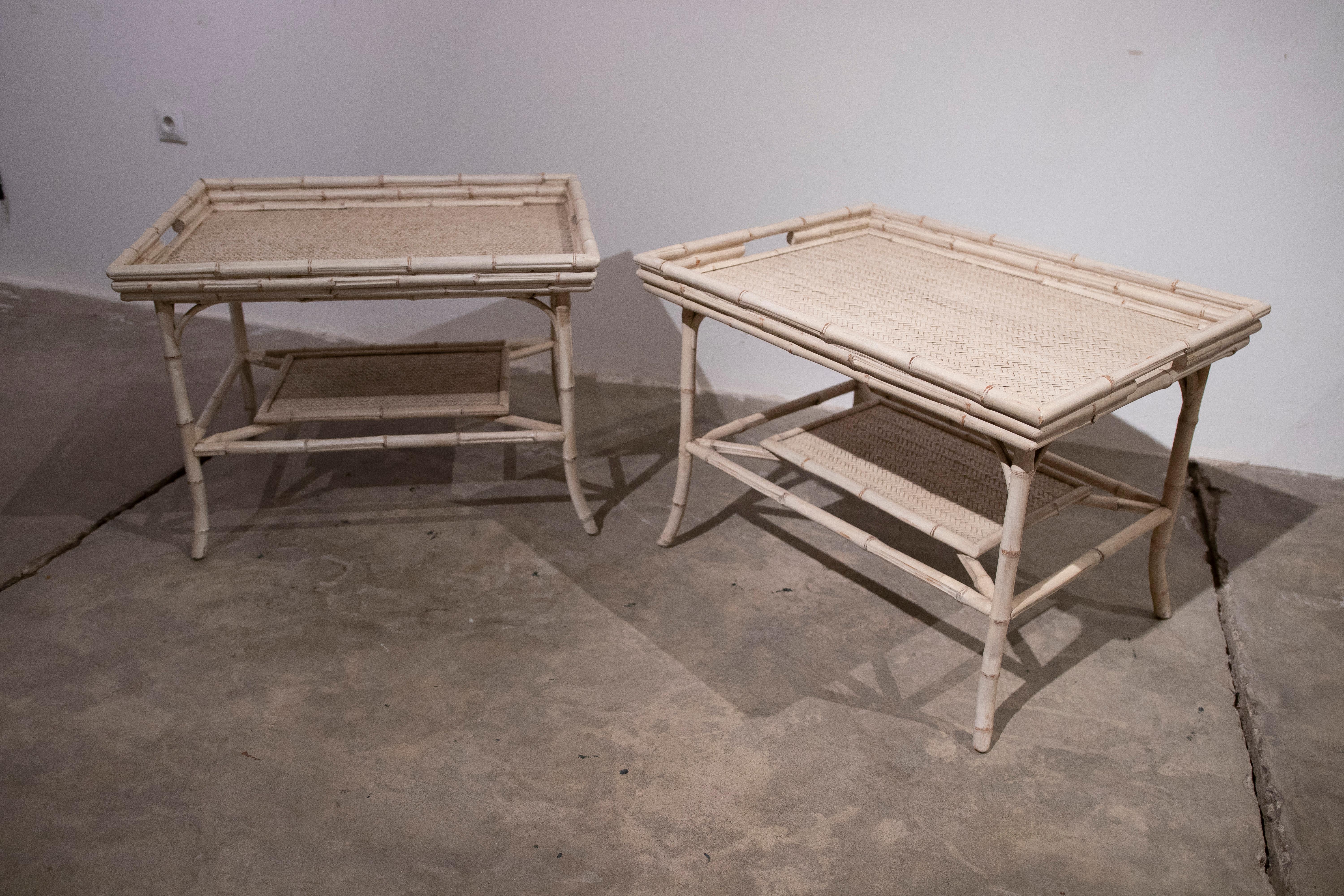 1980s pair of bamboo and wicker tables with removable tray.