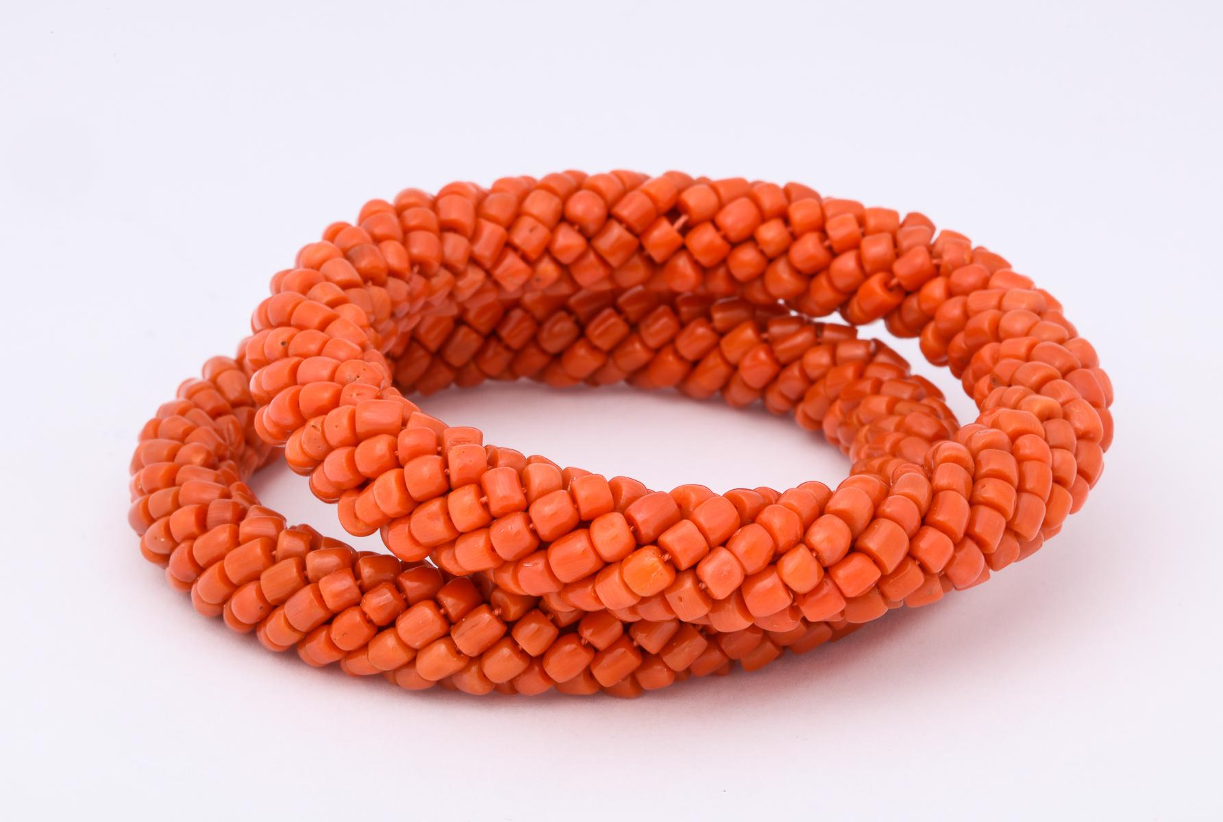 1980s Pair of Braided Design Criss Cross Coral Beads Hard Slip on Bangles In Good Condition In New York, NY