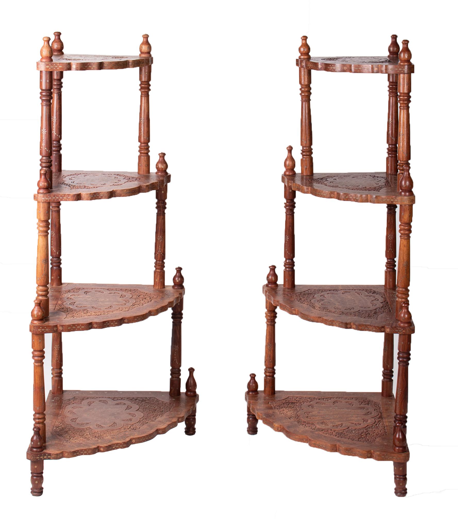 1980s pair of carved step shelves with brass inlays.