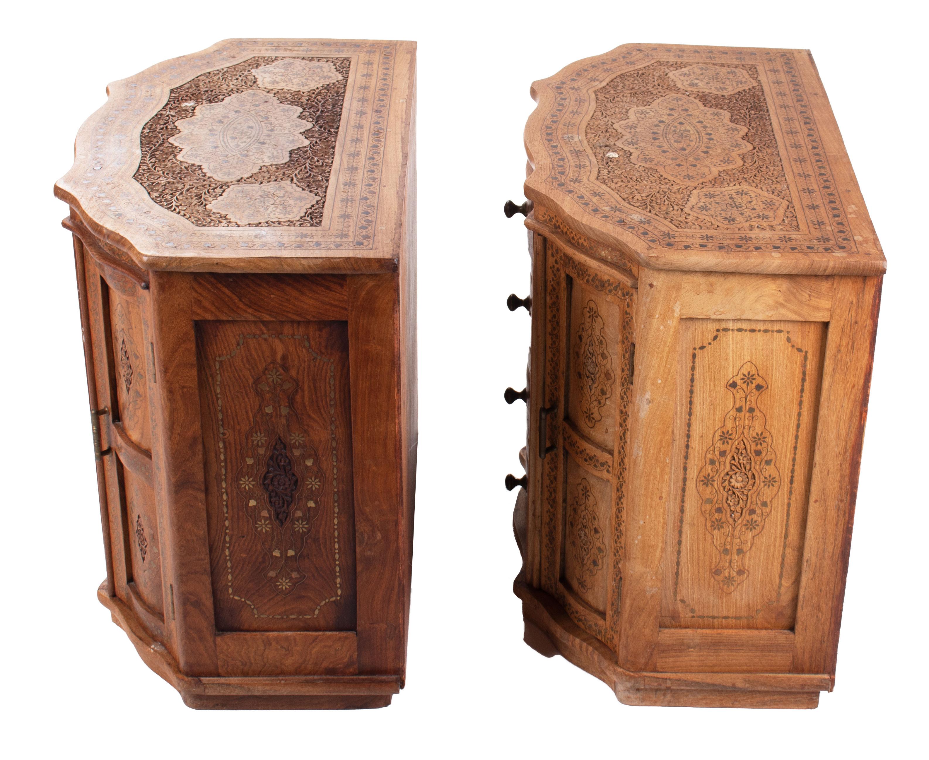 20th Century 1980s Pair of Hand Carved Four-Drawer Chests with Panel Doors and Brass Fittings