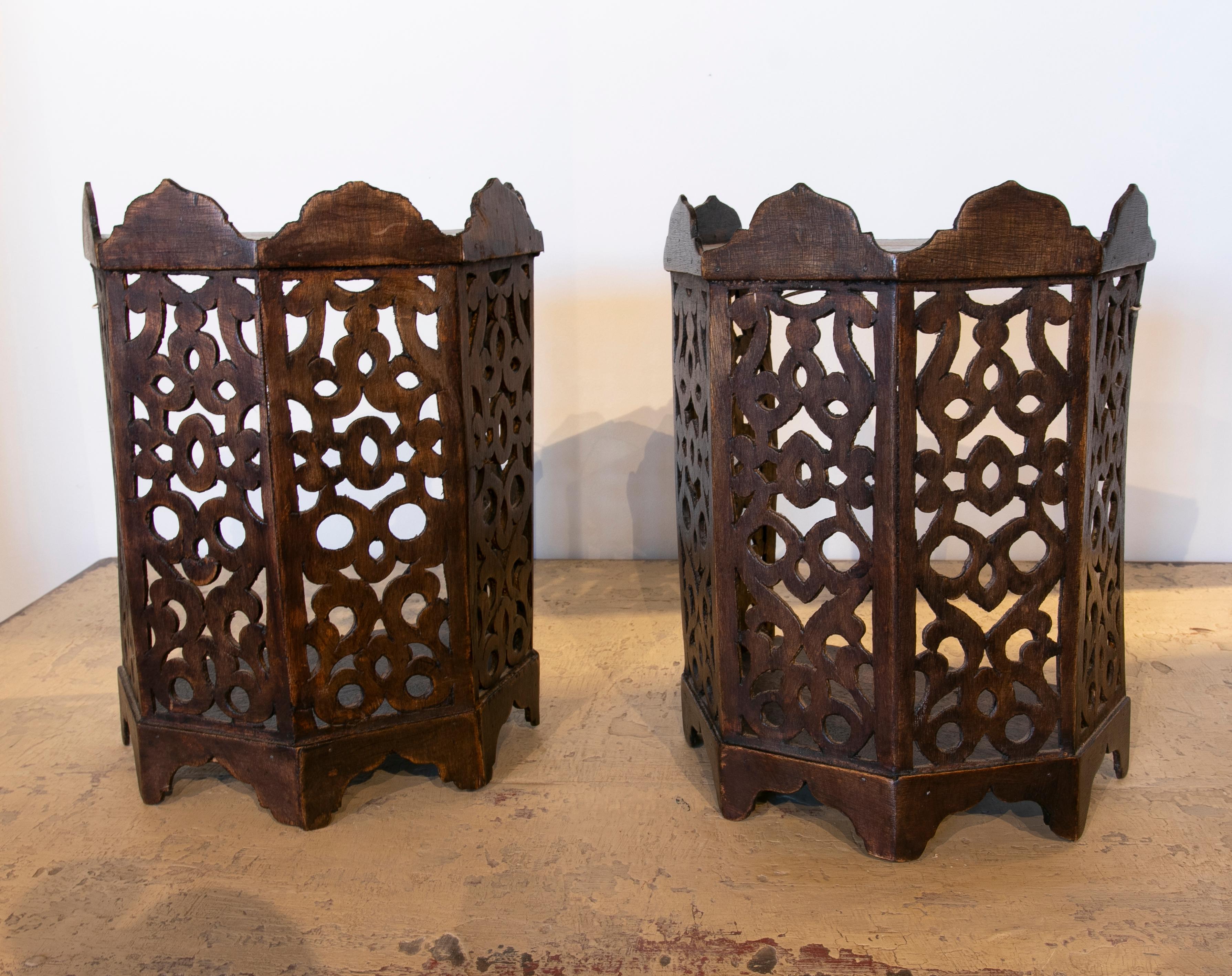 1980s Pair of hand carved wooden wall sconces.