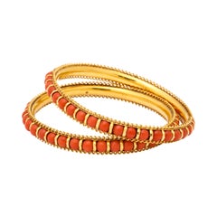 1980's Pair of High Carat Gold Coral Bead Bangle Slip on Bracelets