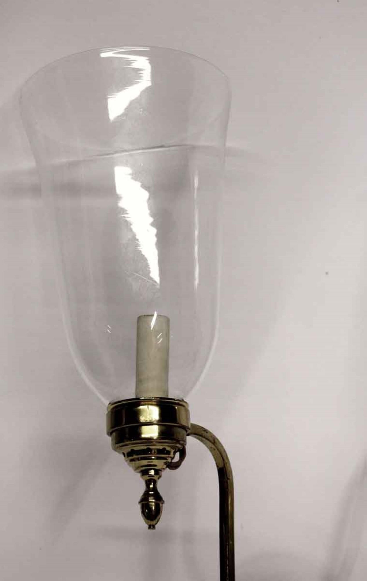 These 20th Century brass and glass sconces are from the NYC Waldorf Astoria Hotel. Priced as a pair. Waldorf Astoria authenticity card included with your purchase. Made by Virginia Metalcrafters. Cleaned and rewired. Small quantity available at time