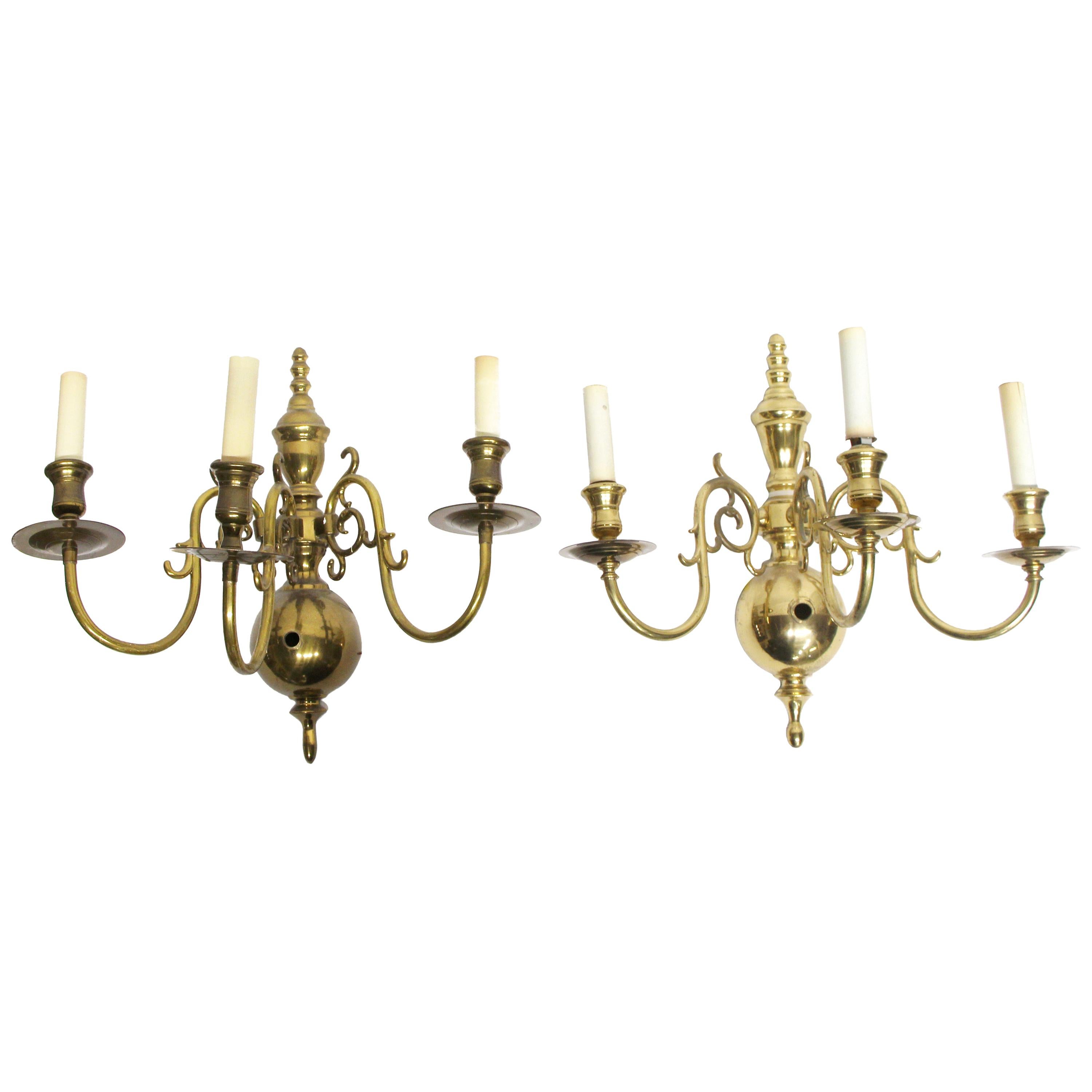 1980s Pair of NYC Waldorf Astoria Hotel Brass Colonial Style Three-Light Sconces