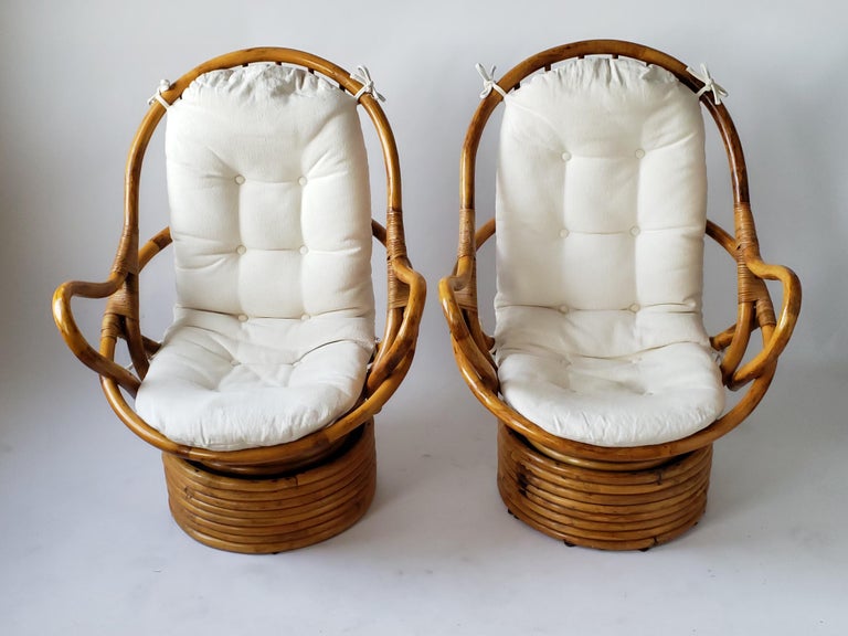 1980s Pair of Rattan Rocking and Swivel Lounge Chair , USA at 1stDibs