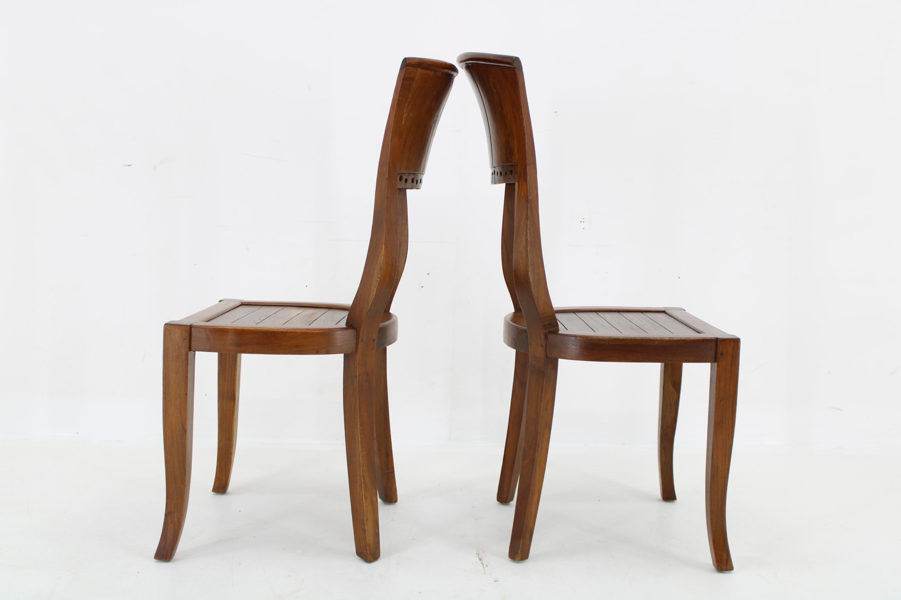 Indian  1980s Pair of Solid Teak Chairs, India  For Sale