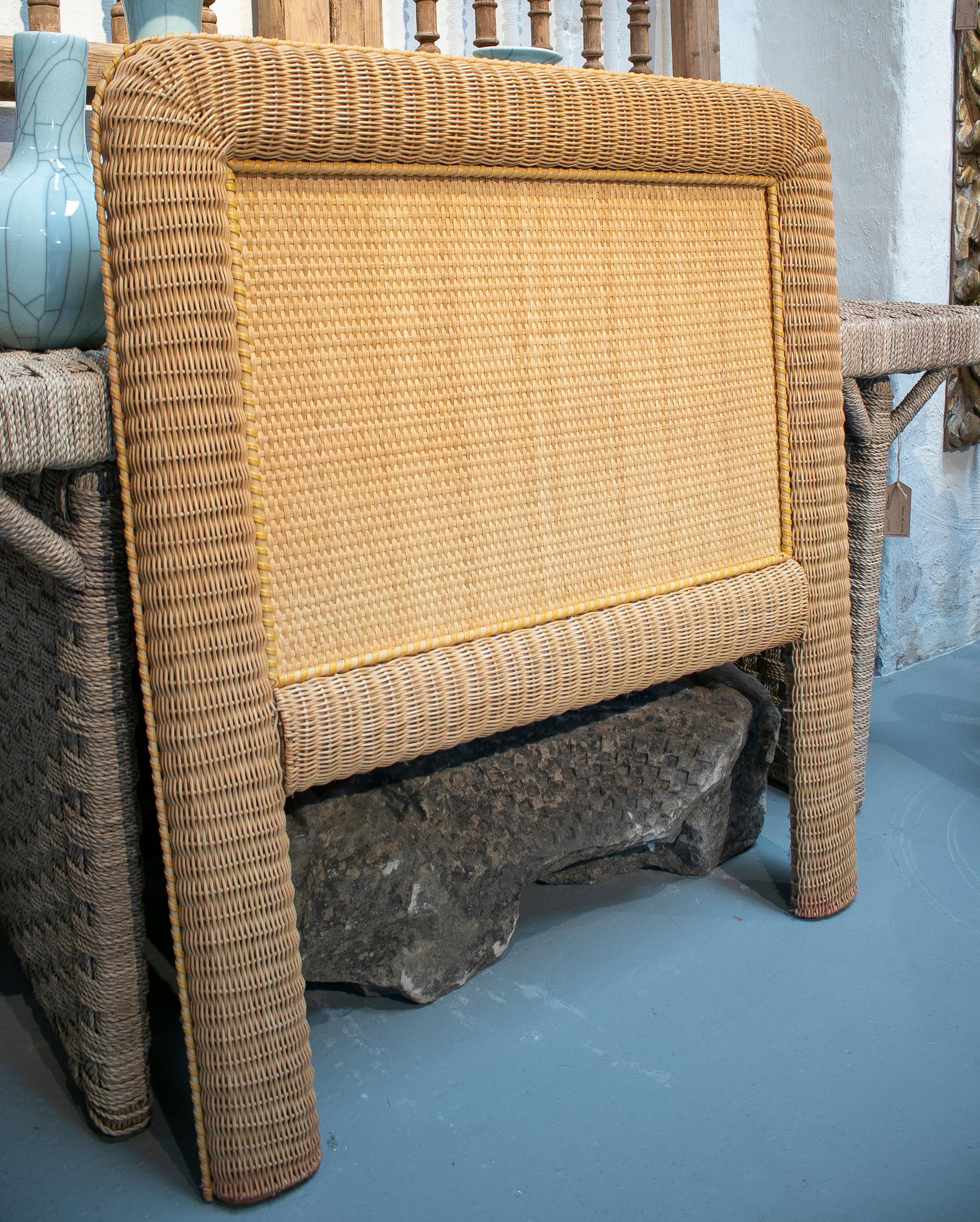 1980s pair of Spanish wicker headboards.