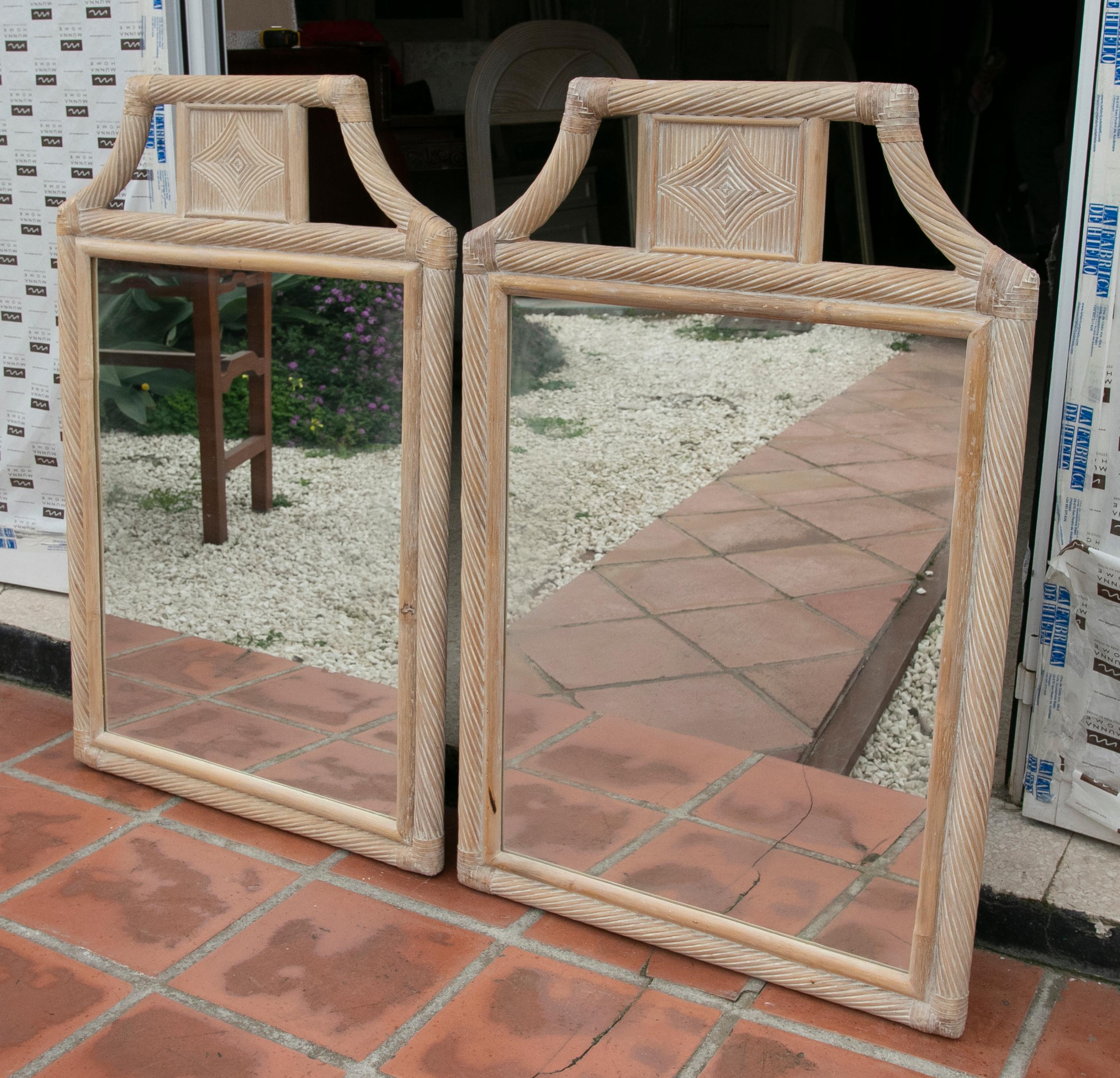 1980s Pair ofwicker wall mirrors.