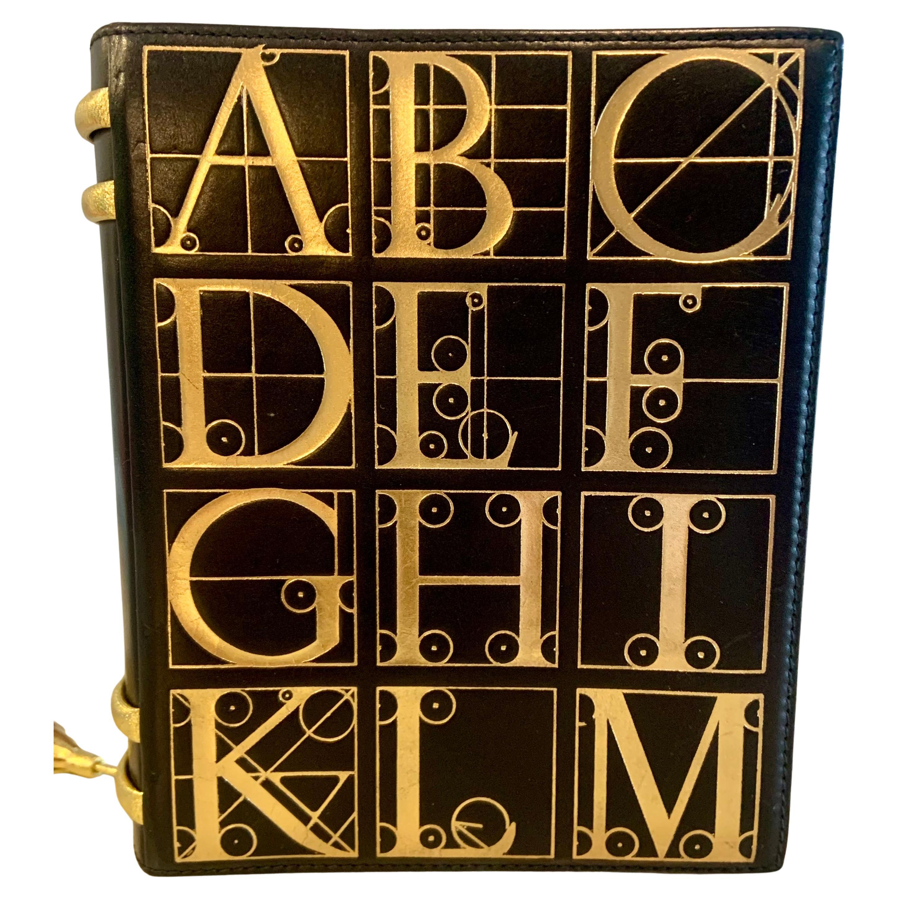 1980's Paloma Picasso Black and Gold Book Bag Clutch en vente