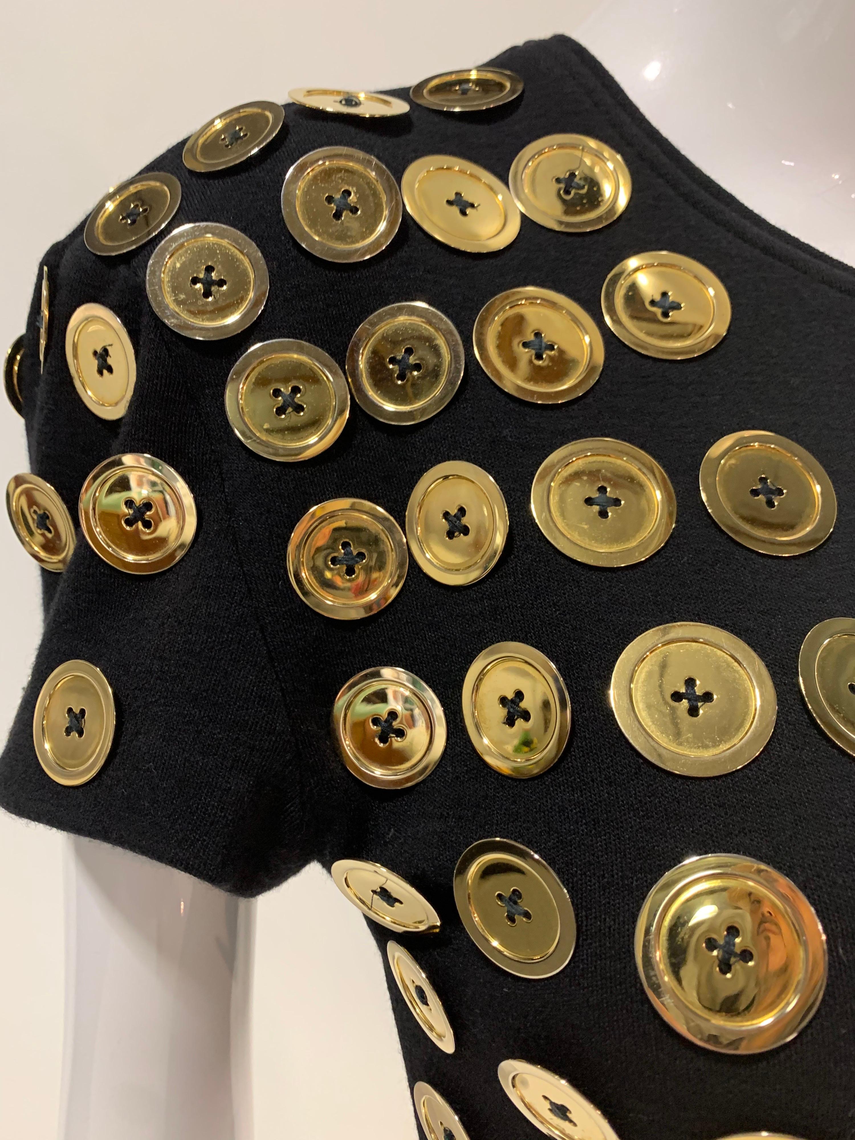 black dress with gold buttons