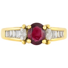 1980s Pear Baguette Diamonds and Center Ruby Ring 1980s Pear Baguette Diamonds and Center Ruby Ring