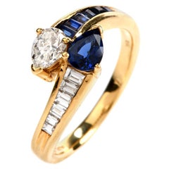 1980s Pear Diamond Sapphire 18 Karat Gold Bypass Engagement Fashion Ring