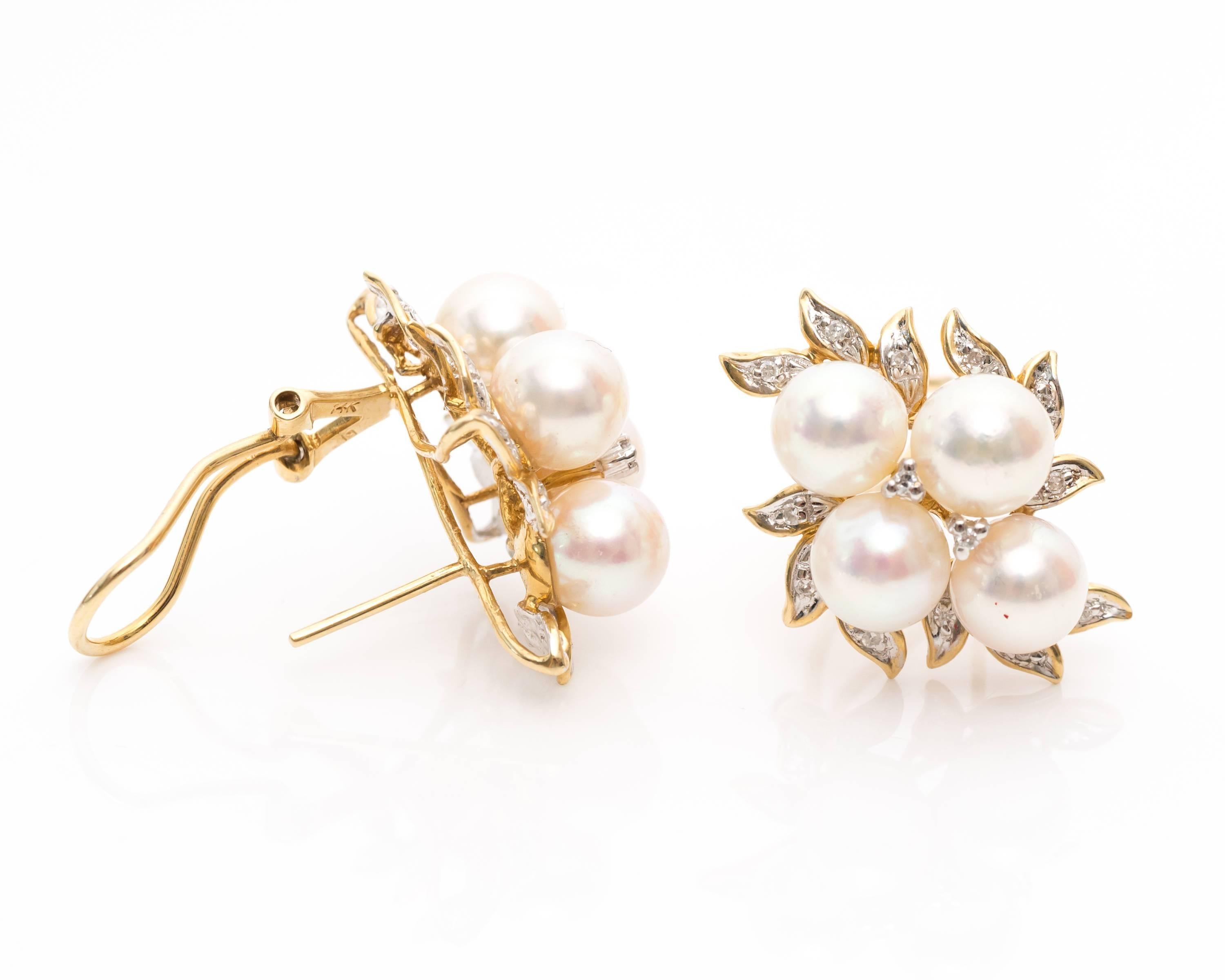 1980s Pearl & Diamond Two Tone Earrings - 18 Karat Gold, 14 Karat Yellow and White Gold, Cultured Pearls, Diamonds

Each earring features 4 large cultured pearls. The pearls have a lovely pink sheen and slightly blistered surfaces similar to blister