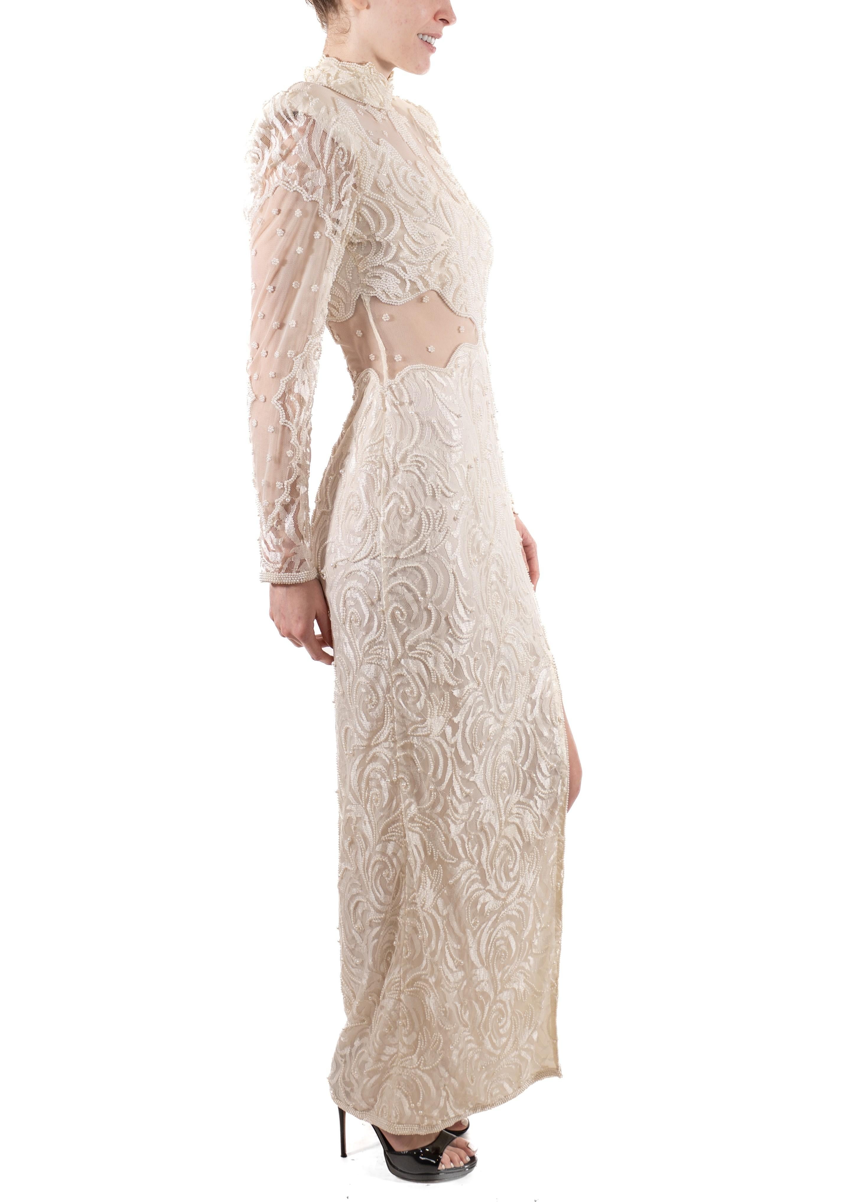 Women's 1980S Pearl White Slinky Beaded Lace Long Sleeved Gown With Sheer Panels For Sale