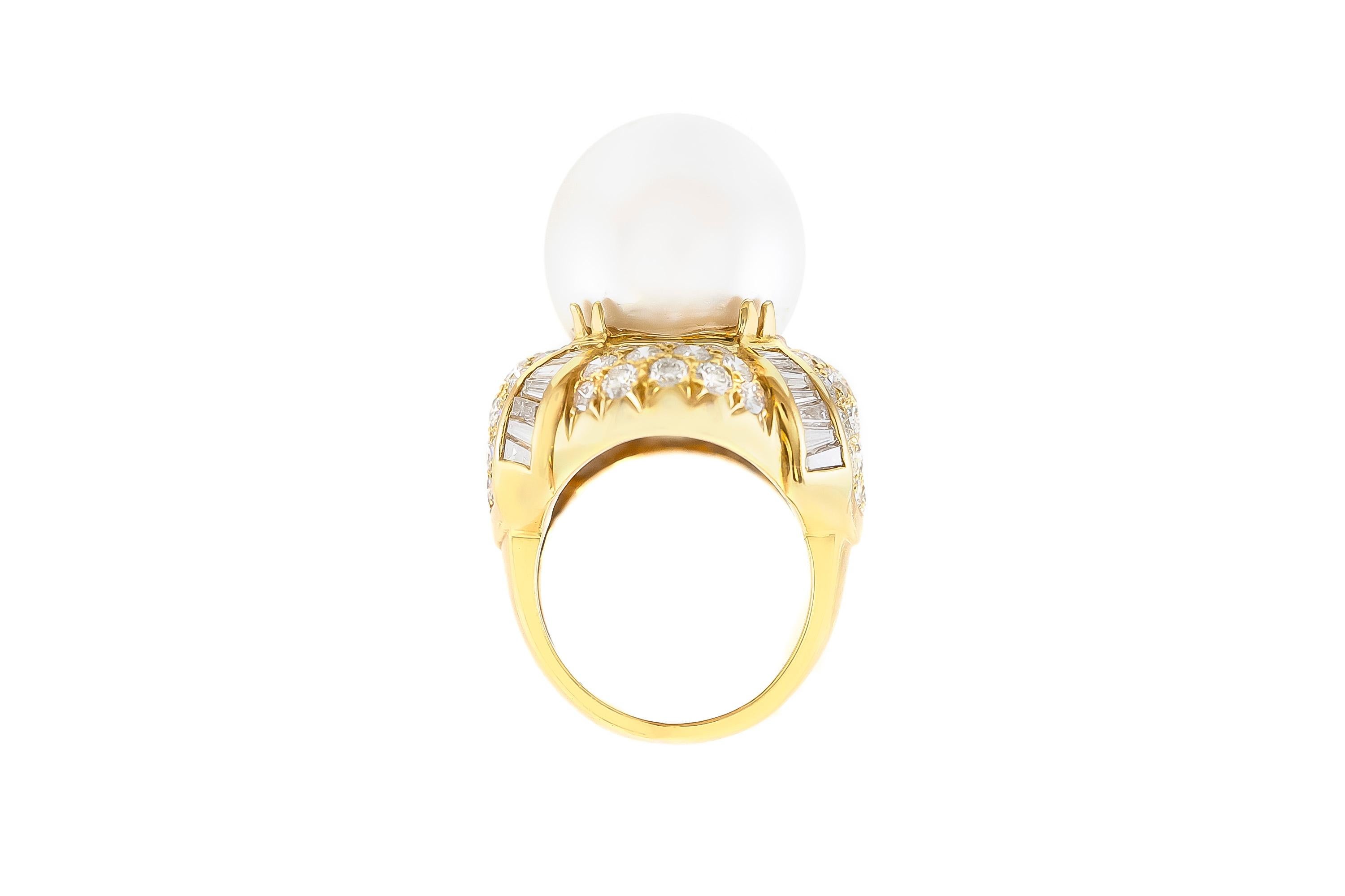 The ring is finely crafted in 18k yellow gold wih center beautiful pearl and diamonds weighing appriximately total of 7.00.
Size of the pearl 17.5-18 mm.
Circa 1980.