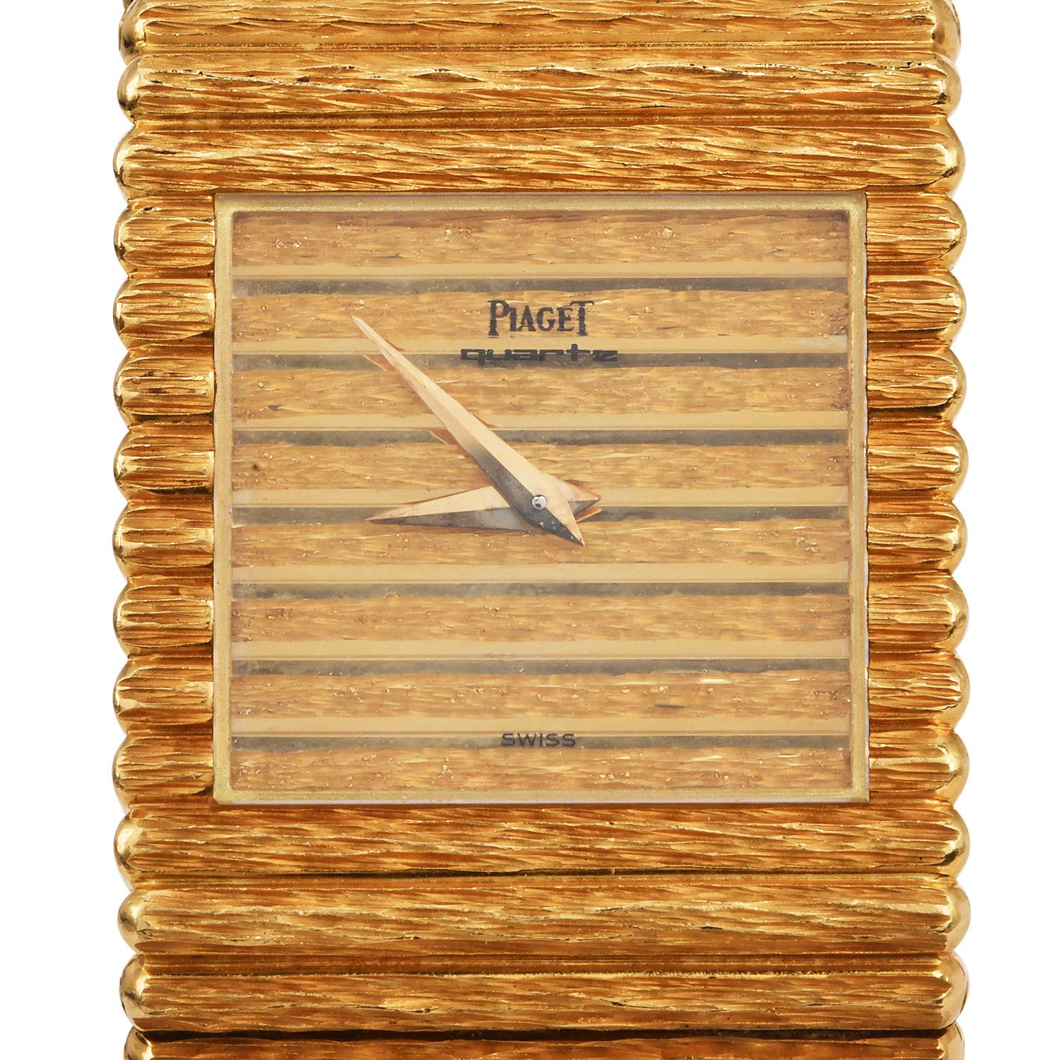 
This outstanding Vintage 1980s Piaget watch is crafted in 18-karat yellow gold and weighs approximately 140  grams of textured, purity-marked gold.

  This Polp Piaget watch is all original with a 25 mm square-shaped case with 4mm depth, and