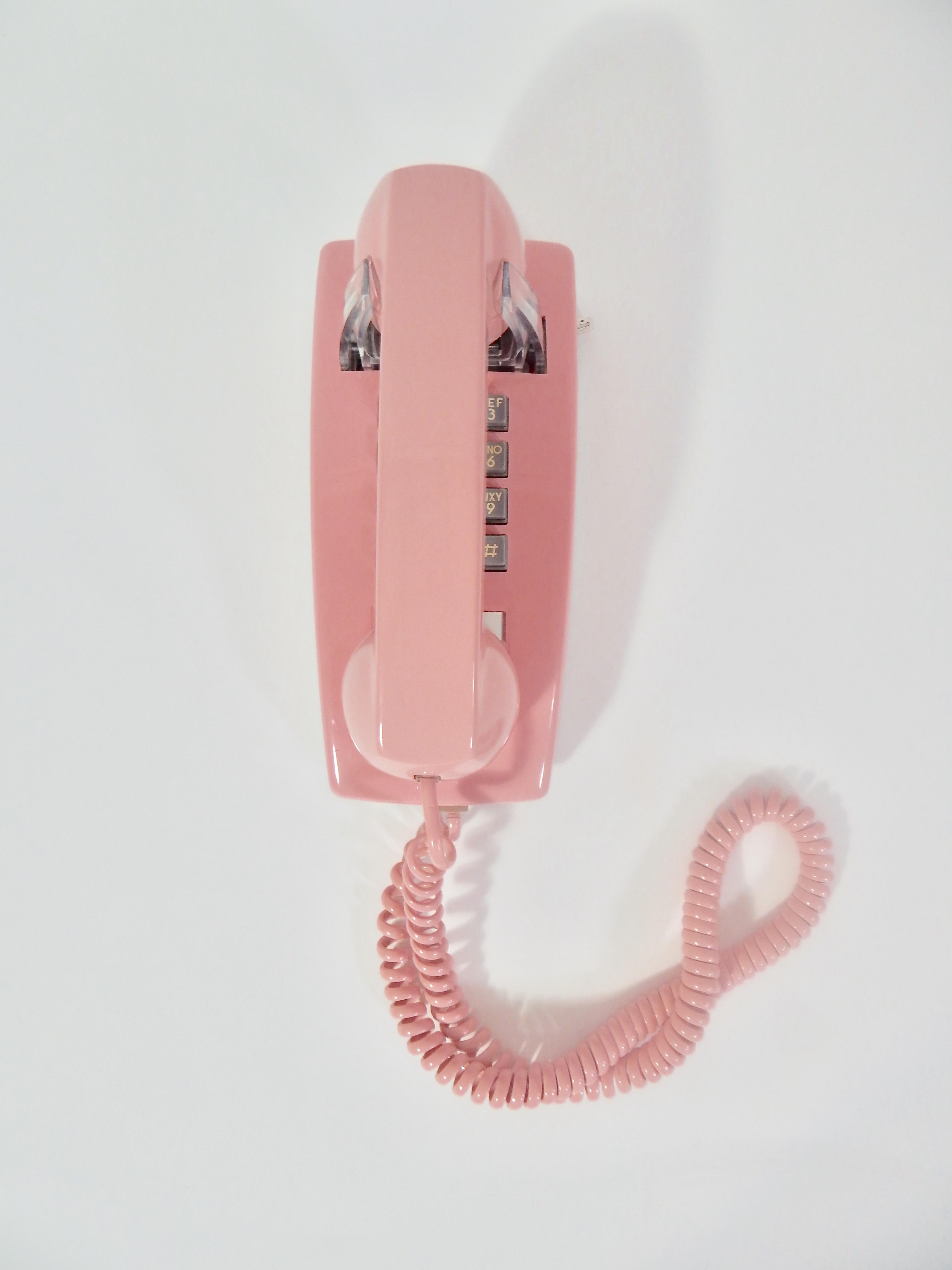 1980s pink telephone for wall. Fun piece! Excellent condition. Possibly never used.
We offer complimentary free domestic shipping for this item.

 