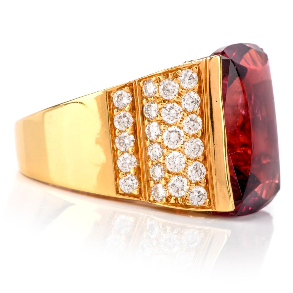 This 1980's estate Tourmaline & Diamond cocktail ring is crafted in solid 18K yellow gold,

and is centered with 1 genuine rectangular cushion cut pink Tourmaline approx. 20.67 carats chanell set.

It is adorned with 44 genuinehigh qualiy round cut