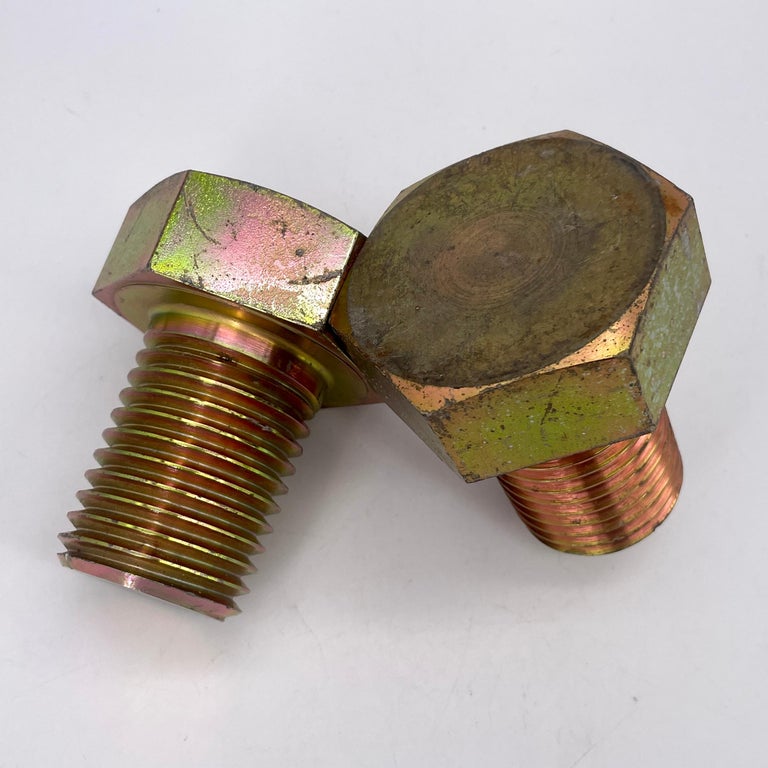 Brass electroplated Bridge Bolts as bookends or office decor. Each about 5 lbs. and 3.5 wide by 4 inches high. Appropriated objects similar conceptually to the works of the Carl Aubock workshop.