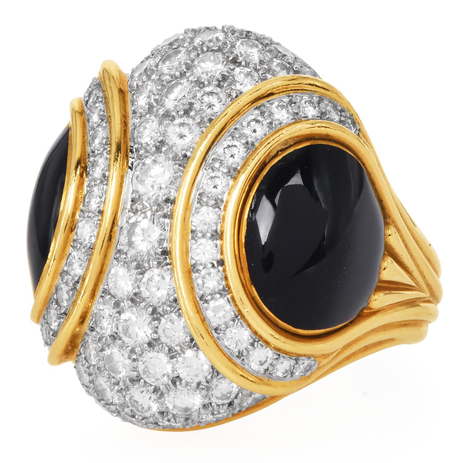 A glamorous, high-impact early 1980s cocktail ring, this dome cocktail ring features rich inlay-set black jade flanking a central concave surface fully pavé-set with natural round brilliant diamonds. Crafted in luxurious 18K yellow gold with a
