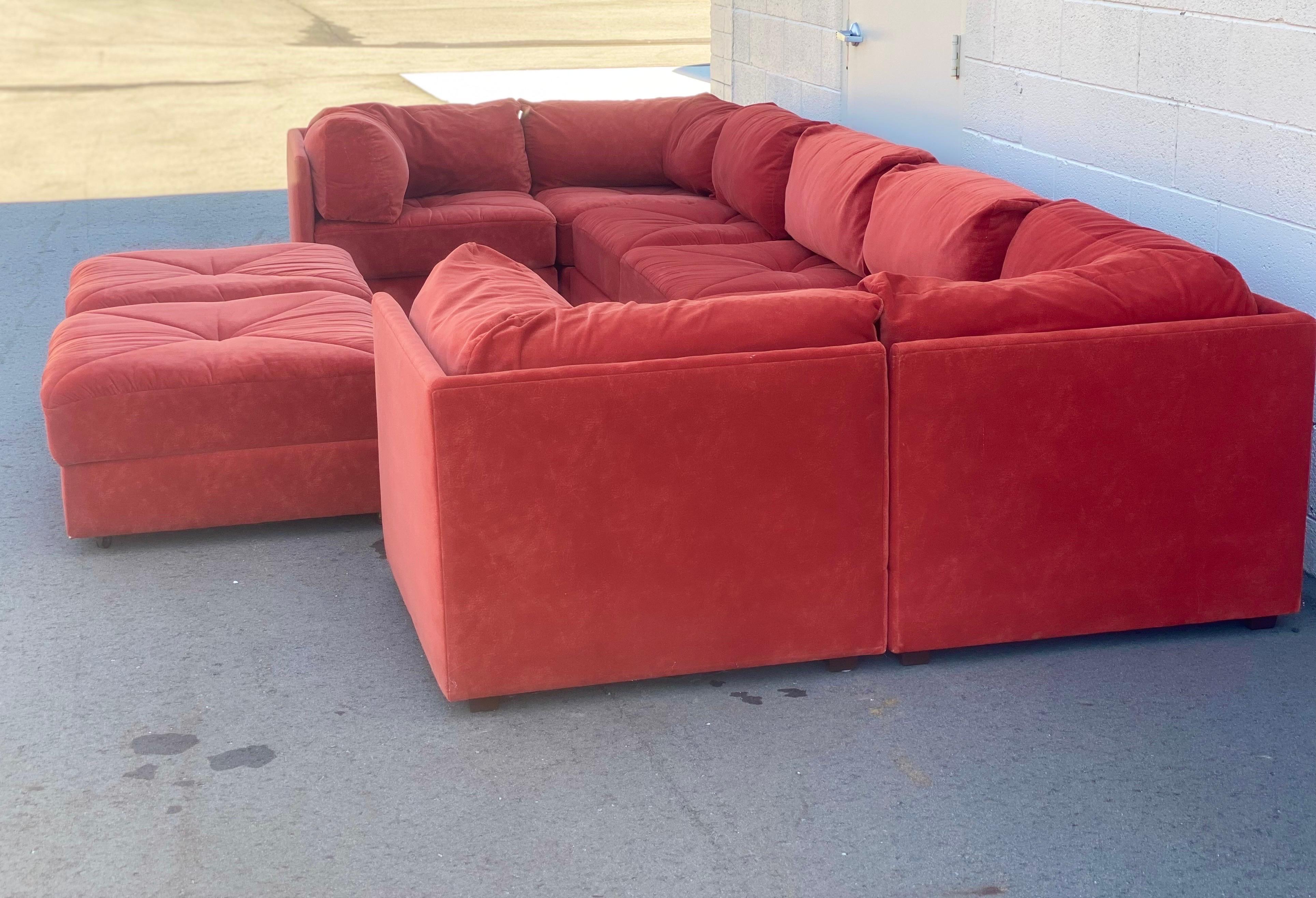 We are very pleased to offer a modern playpen sofa, circa the 1980s. Long, lean, and super comfortable, this ten-piece sectional lounges low to the floor, its modular design nods to the relaxed modernism of the mid-20th century. This versatile piece