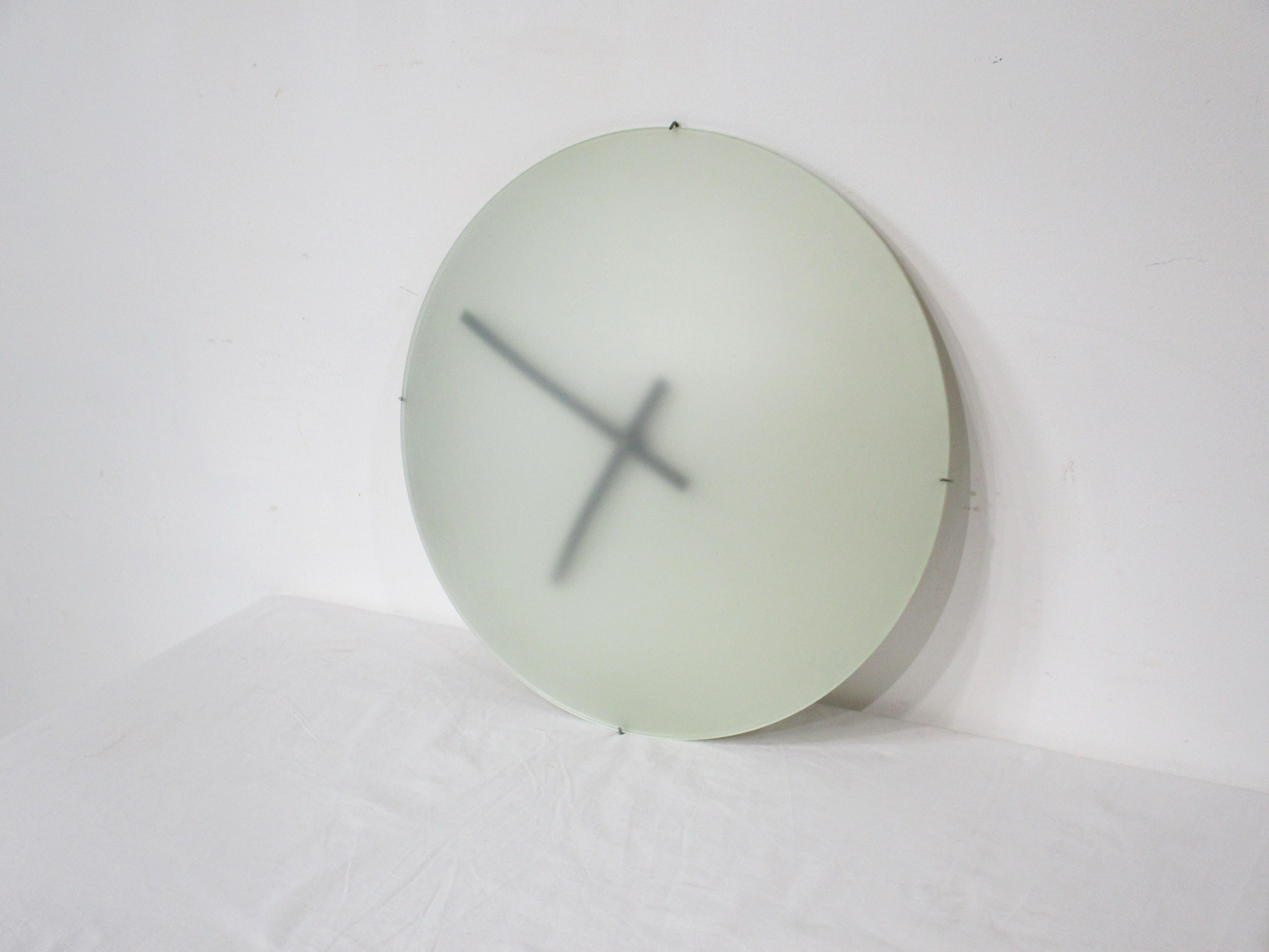 A Pop Art frosted glass domed faced wall clock with black hands designed in 1980 by Paul Schudel . This design resides in the collection of the MOMA museum featuring a spacy modern clean look . The clock works are battery operated and is functioning