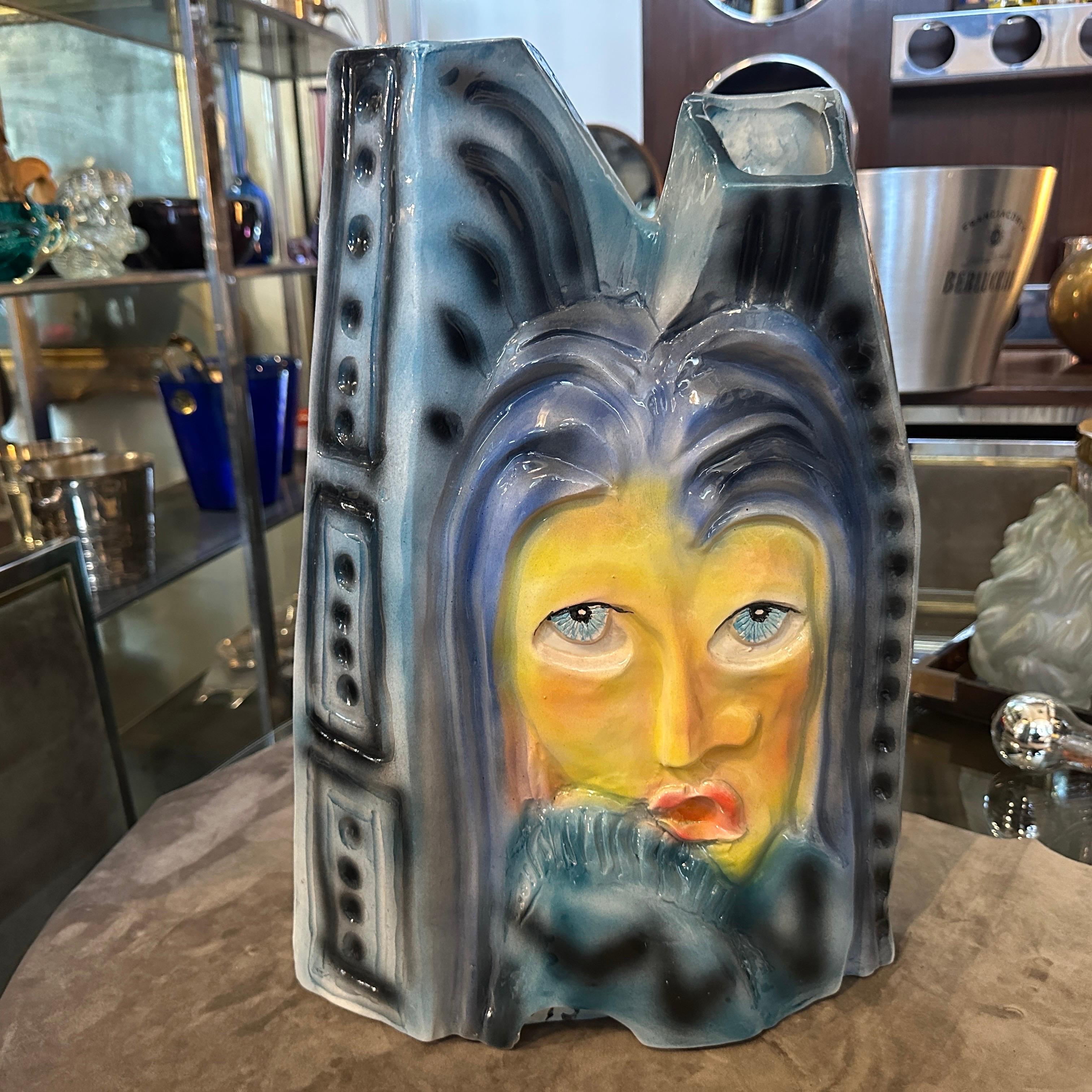 Intriguing 1980s Post-Modern Hand-Crafted Ceramic Sculptural Italian Vase
Unleash the spirit of 1980s Post-Modernism into your space with this captivating and uniquely expressive ceramic sculptural vase, hand-crafted in Italy. 
The vase presents a