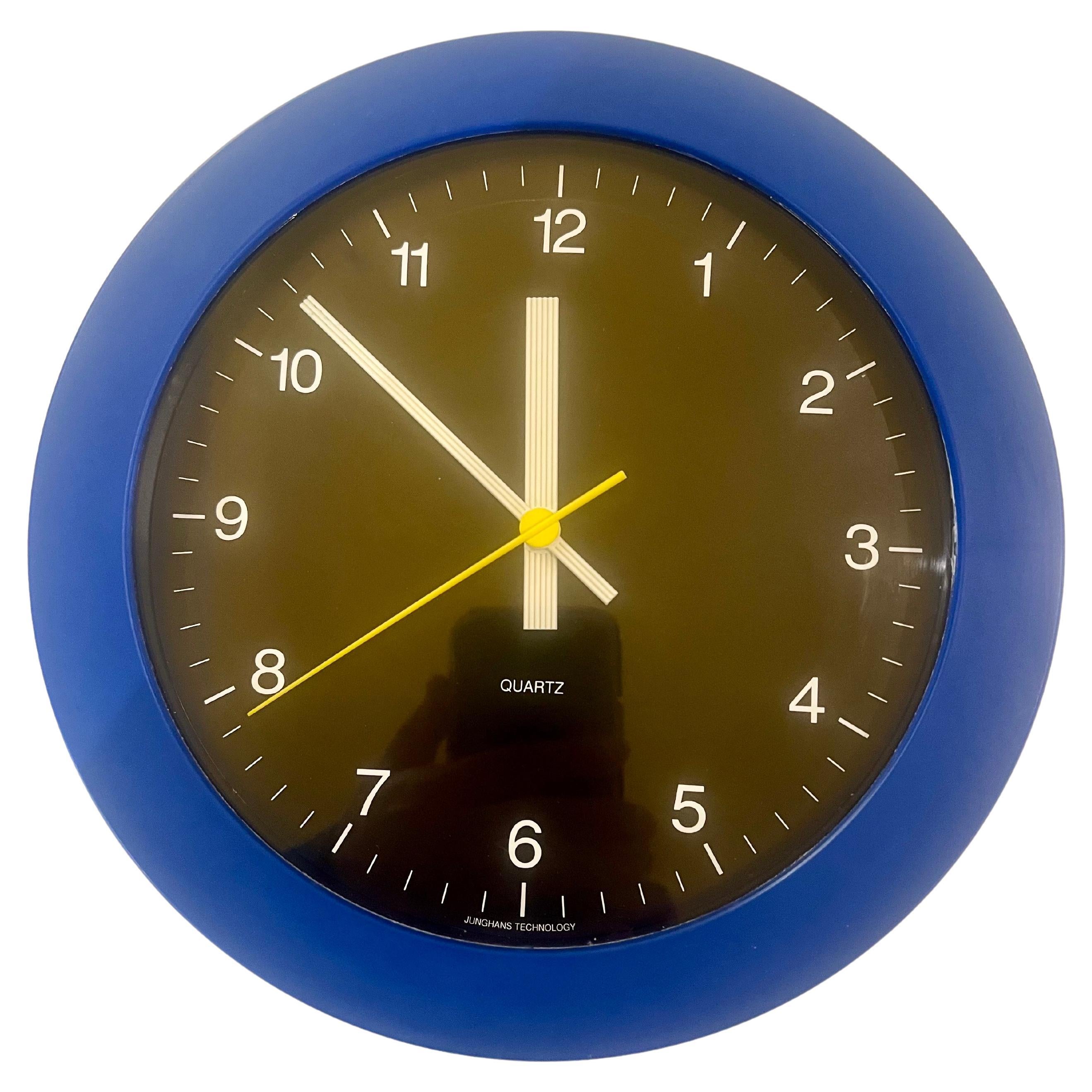 Beautiful simple design great colors on this cool 1980's , postmodern design wall clock made by Junghans with German movement and the case made in France in plastic very nice condition we have polished the plastic , the clock works great and keeps