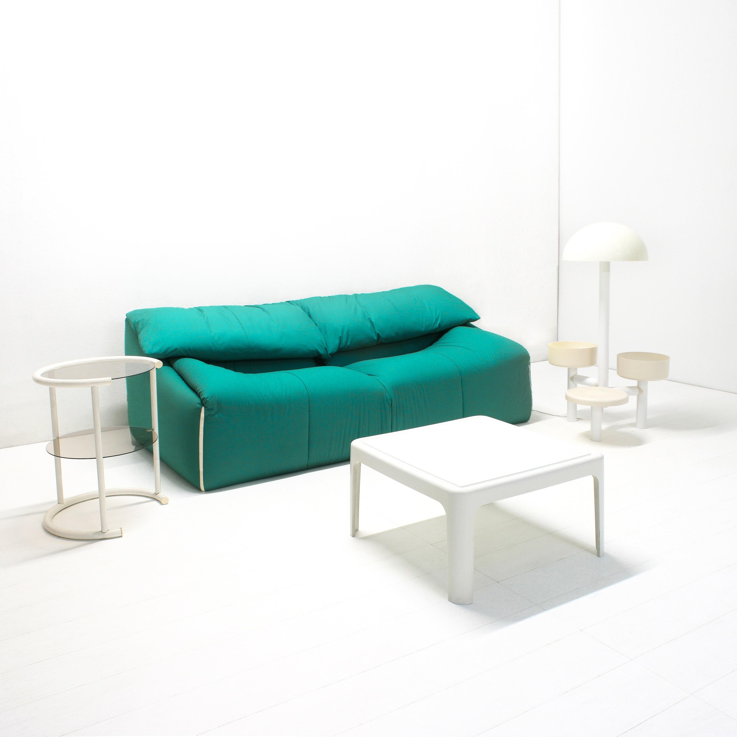 A super comfortable Plumy large two-seater sofa designed in 1980 by Annie Hiéronimus for Cinna, France.

This sofa is still in great condition. with its very nineties soft to touch turquoise/green upholstery and adaptable cushions makes it a great