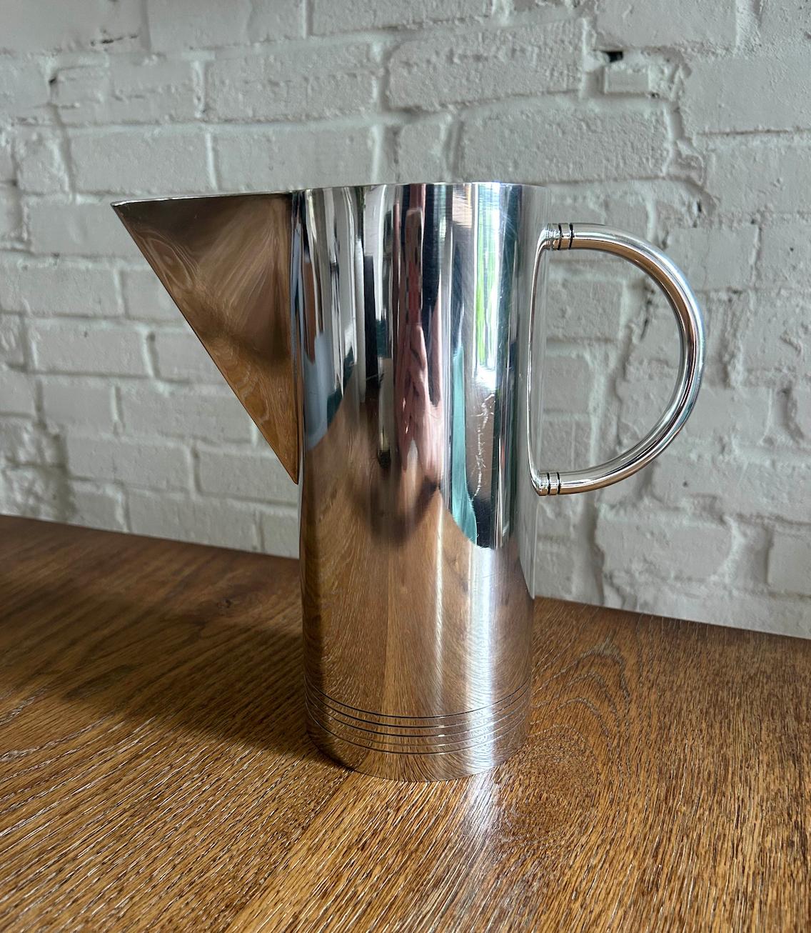 Circa 1980s silverplate pitcher by Richard Meier for Swid Powell of New York City. Made in Argentina and in great vintage condition. Marked 
