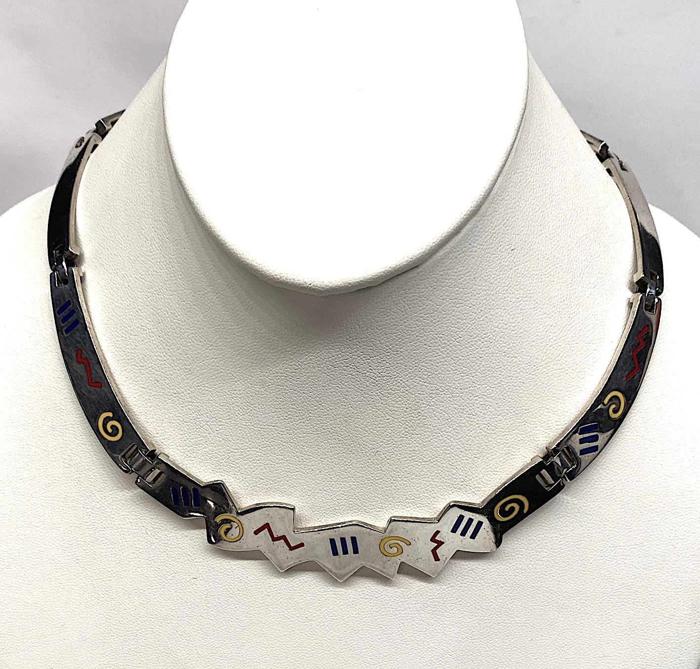 A one of a kind artist made Memphis style post modernist sterling necklace with enamel accent from the 1980s. The necklace has a nice weight  of 85 grams and is beautifully executed in 9 flat links 2mm or 1/16 of an inch thick. It is 16.5 inches in