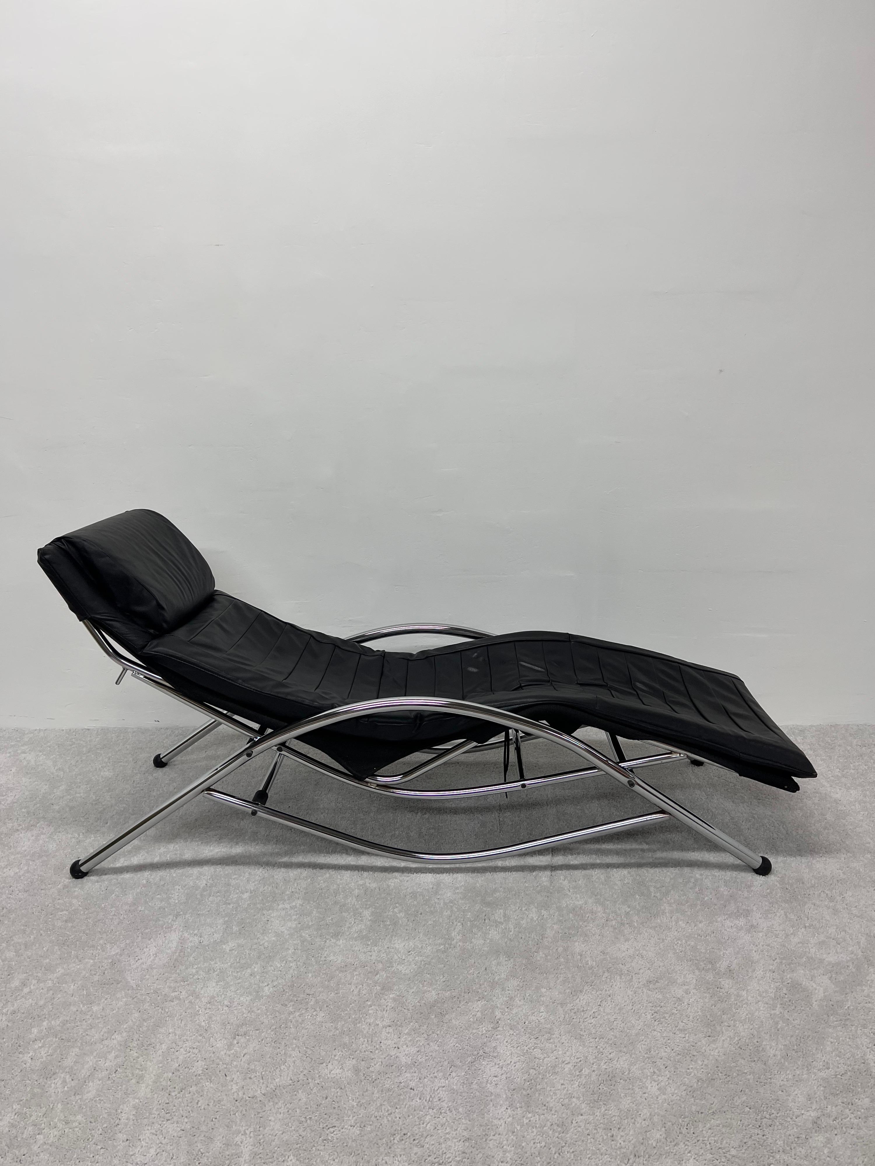 Black leather seat and pillow on tubular chrome adjustable frame chaise lounge, Italy 1980s.