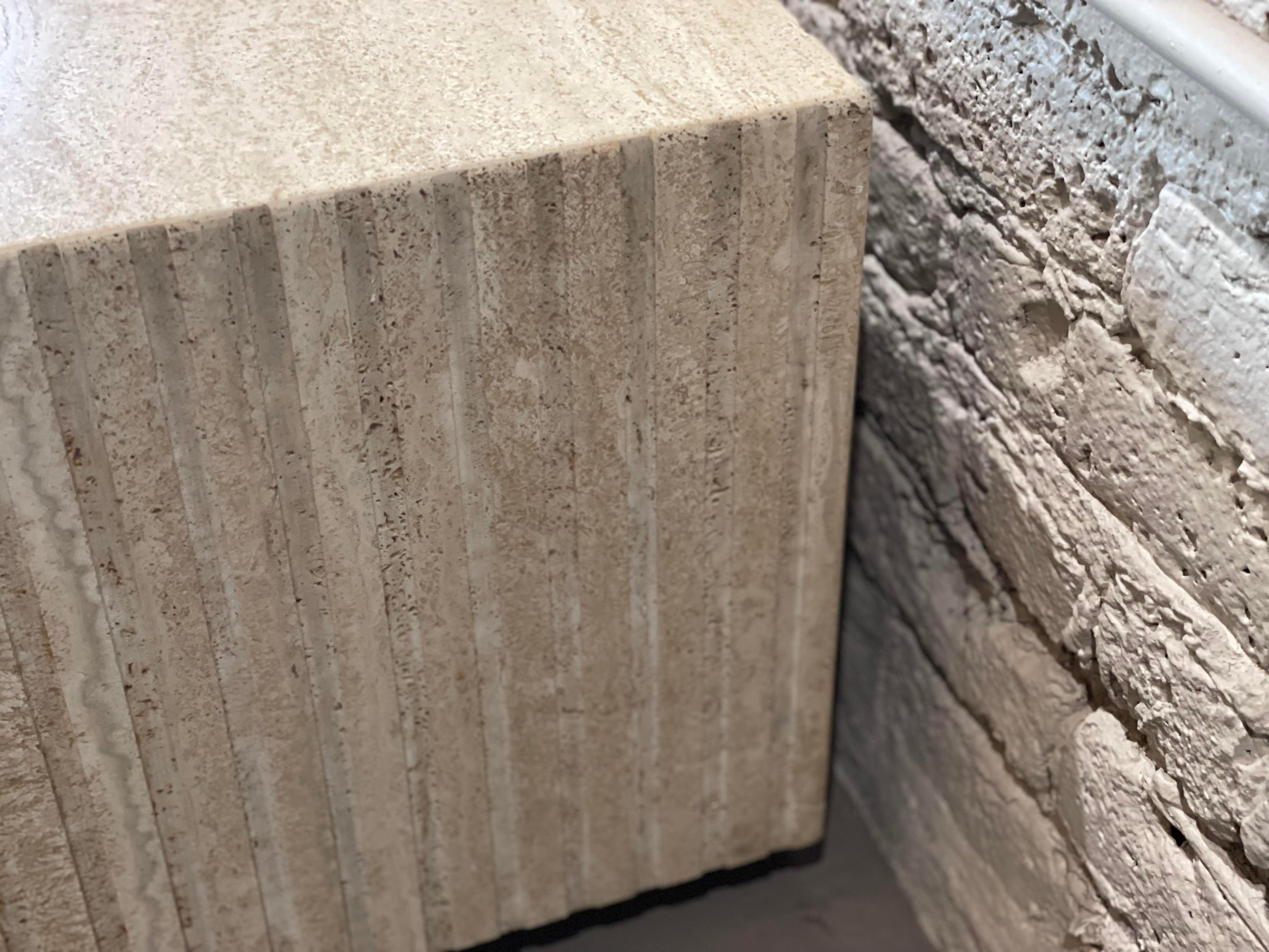 Absolutely stunning table in impeccable vintage condition. I love that it’s on wheels!! Making this table easily moveable but because of its weight it stays in place well.

Beautiful aged travertine has the best patina and the channeled sides