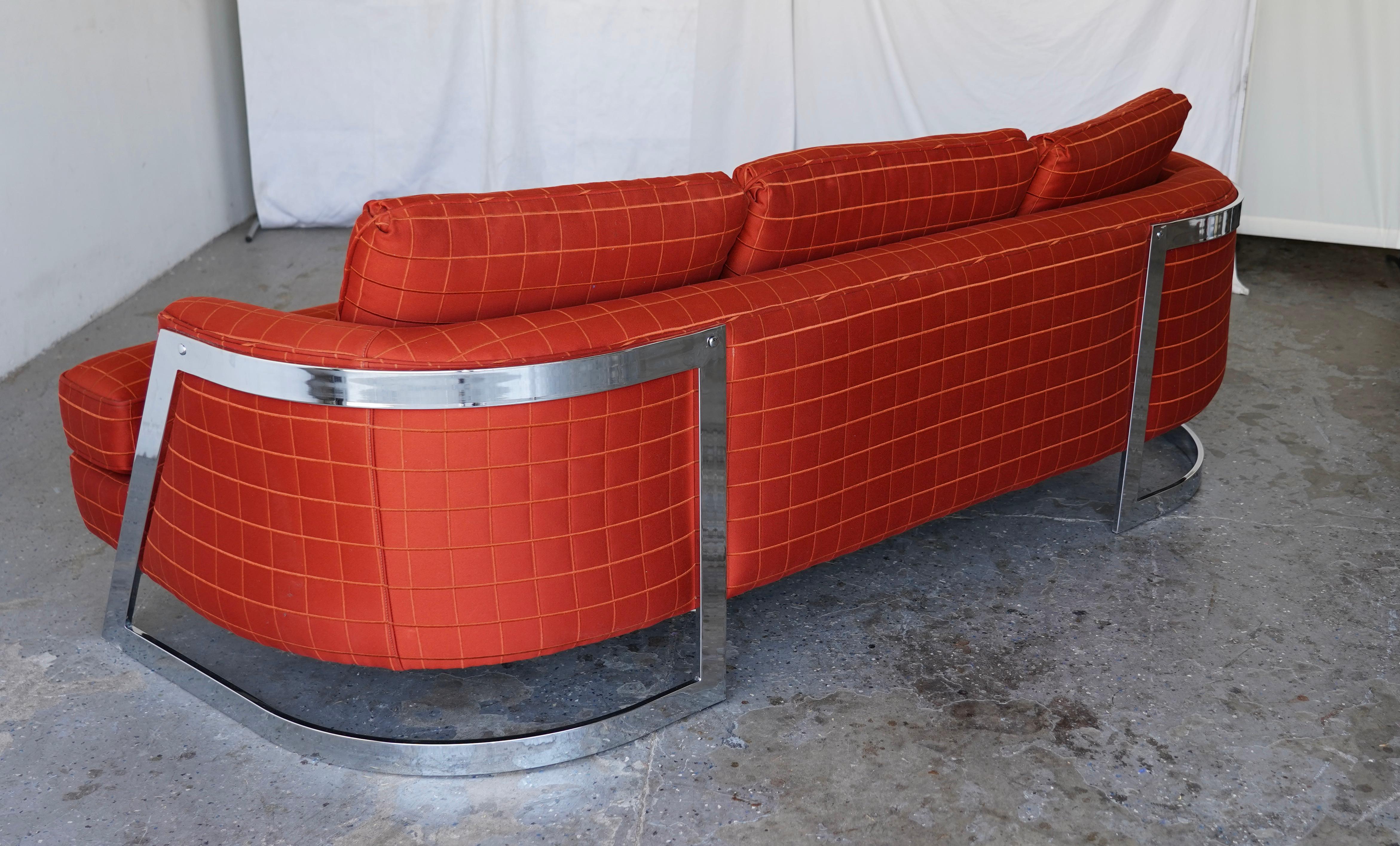 A striking postmodern sofa from the coveted Flair Line collection by Bernhardt Furniture, circa 1980s. This piece exemplifies the era’s bold reinterpretation of mid-century modern design, combining clean architectural lines with glamorous chrome