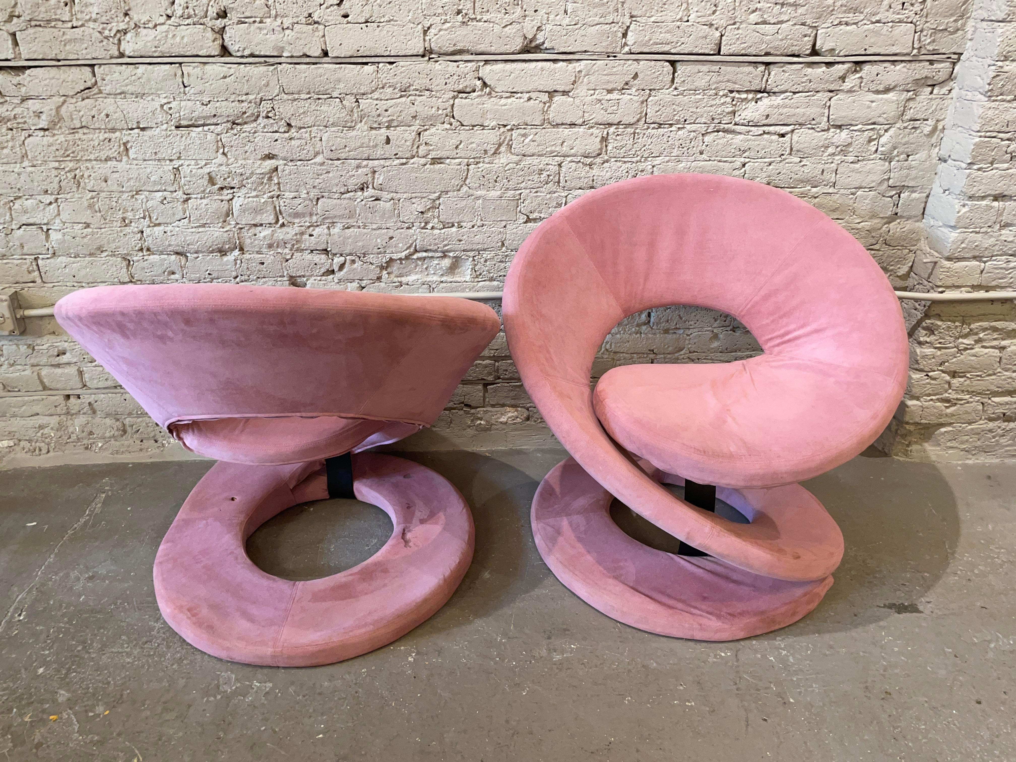 These chairs are comfortable! Who would have thought? I always assumed they were just sculptural until I finally found a pair and I am thrilled by the design. They also have good scale.

Original pink microsuede fabric (should be reupholstered).