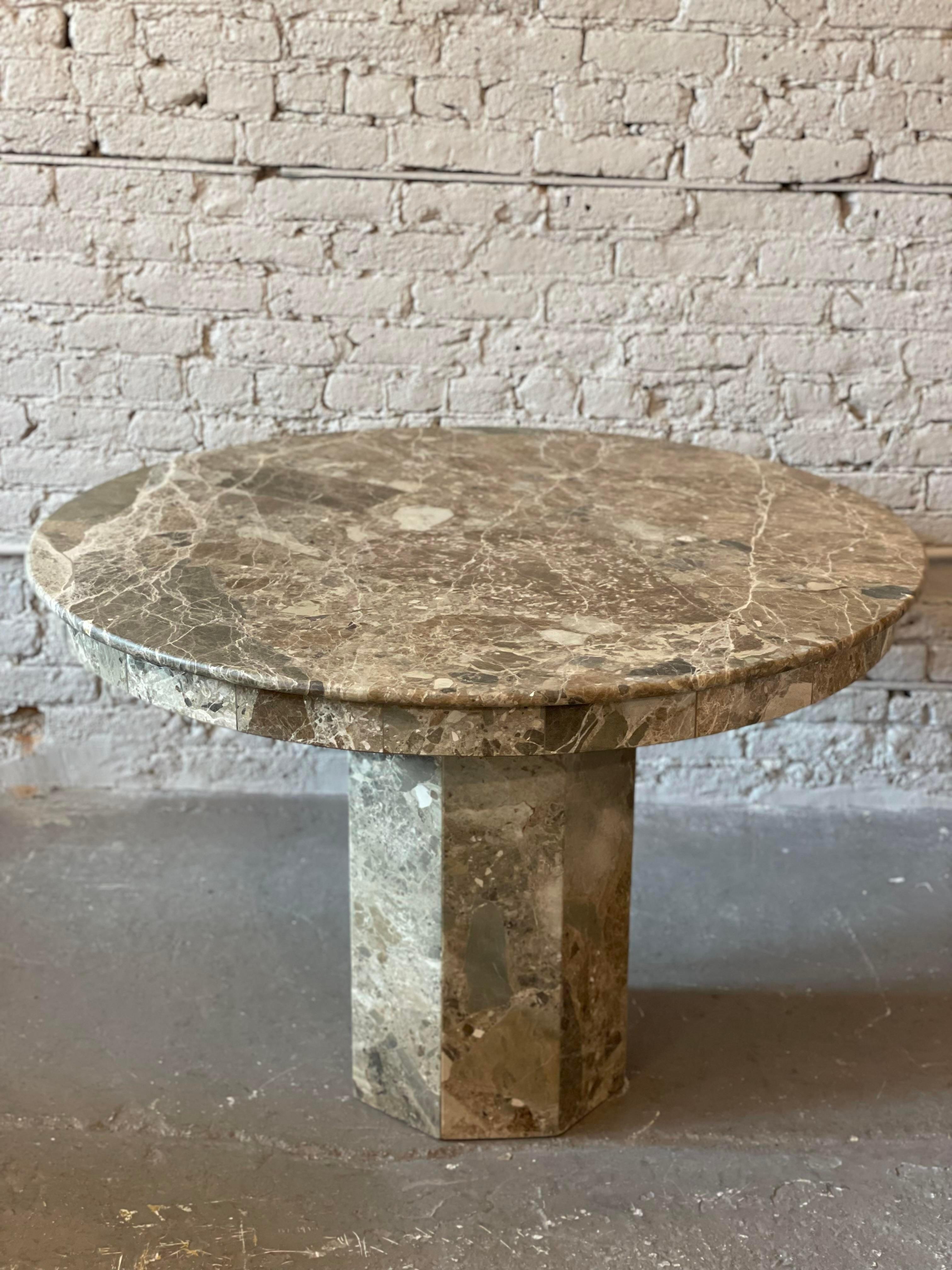 Gorgeous marble small dining or entry table. I had the lacquer professionally removed to create this understated honed finish.