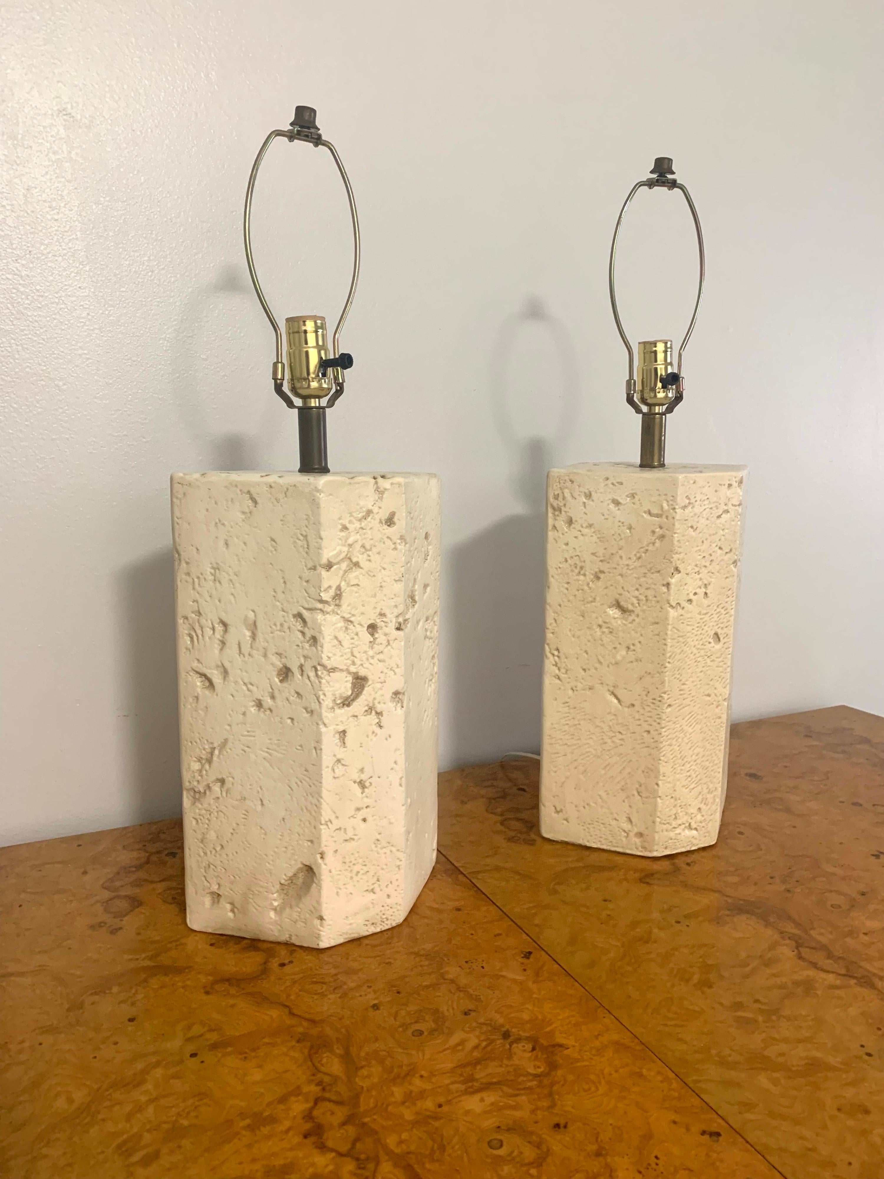 Pair of Postmodern plaster lamps. Faux coral design. In a stretched hexagonal silhouette. No chips or cracks. Great natural look. Would look good in Mid Century Modern, Postmodern and Minimalist settings.