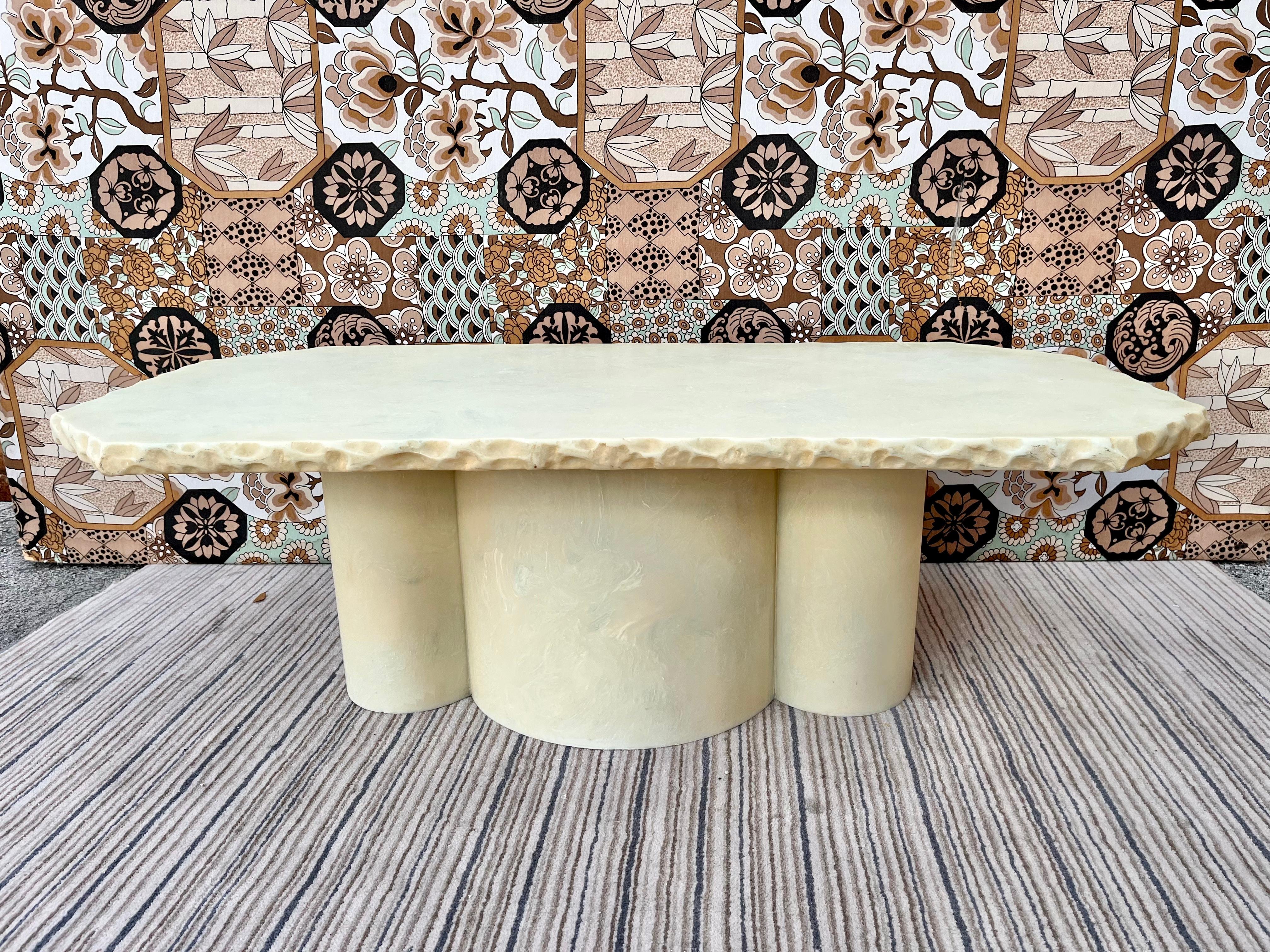Late 20th Century Postmodern Faux Marble Resin coffee / cocktail table. Circa 1980s
Probably one of a kind, this handcrafted coffee or cocktail table features a green-yellowish tones marbleized appearance with raw or rough edges all around. The top