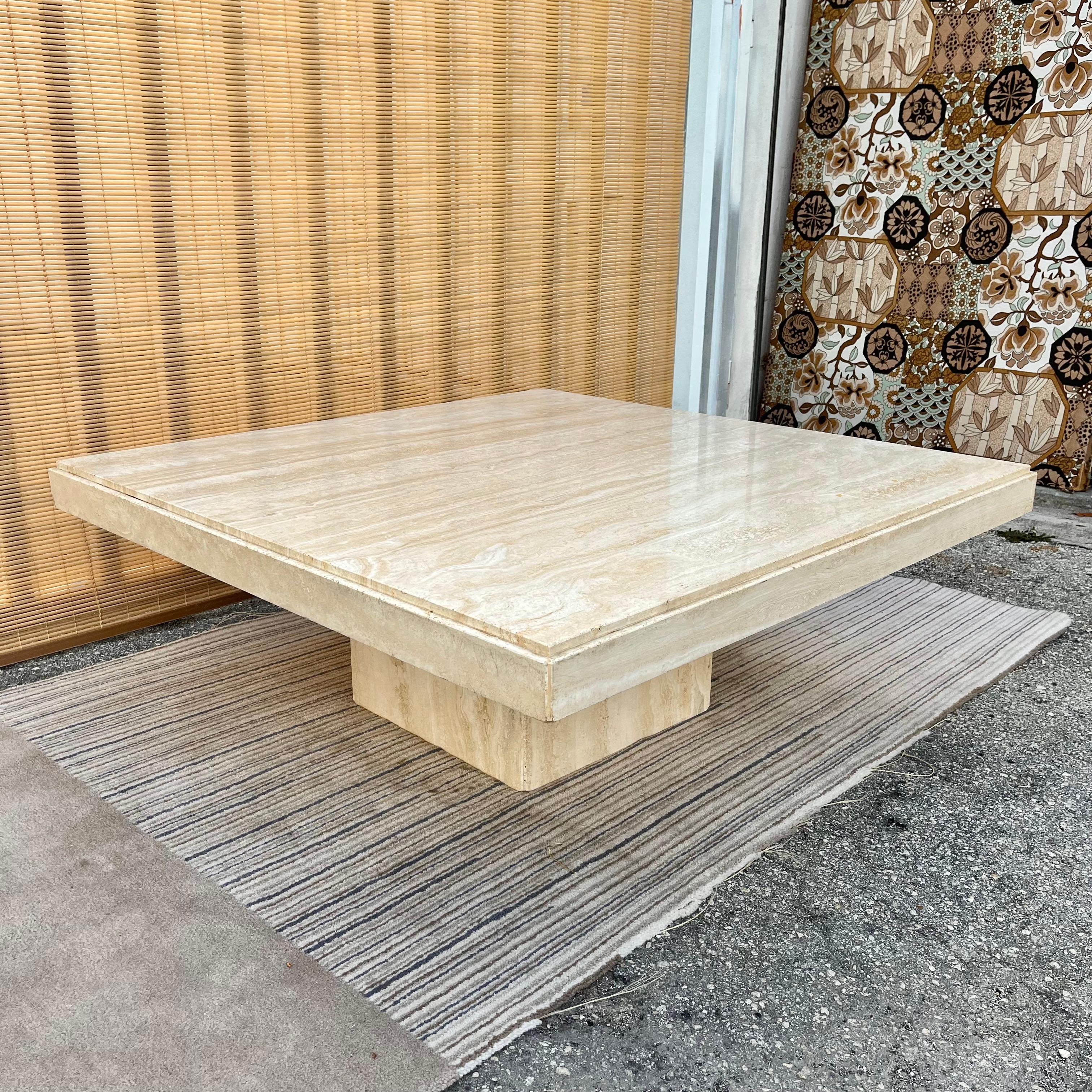 Large Postmodern Italian travertine square coffee table by Stone Intentional Florence, Italy. Circa mid-1980s.
Features a minimalist design with different shades of light beiges and tans tones. With a polished travertine stone surface, with