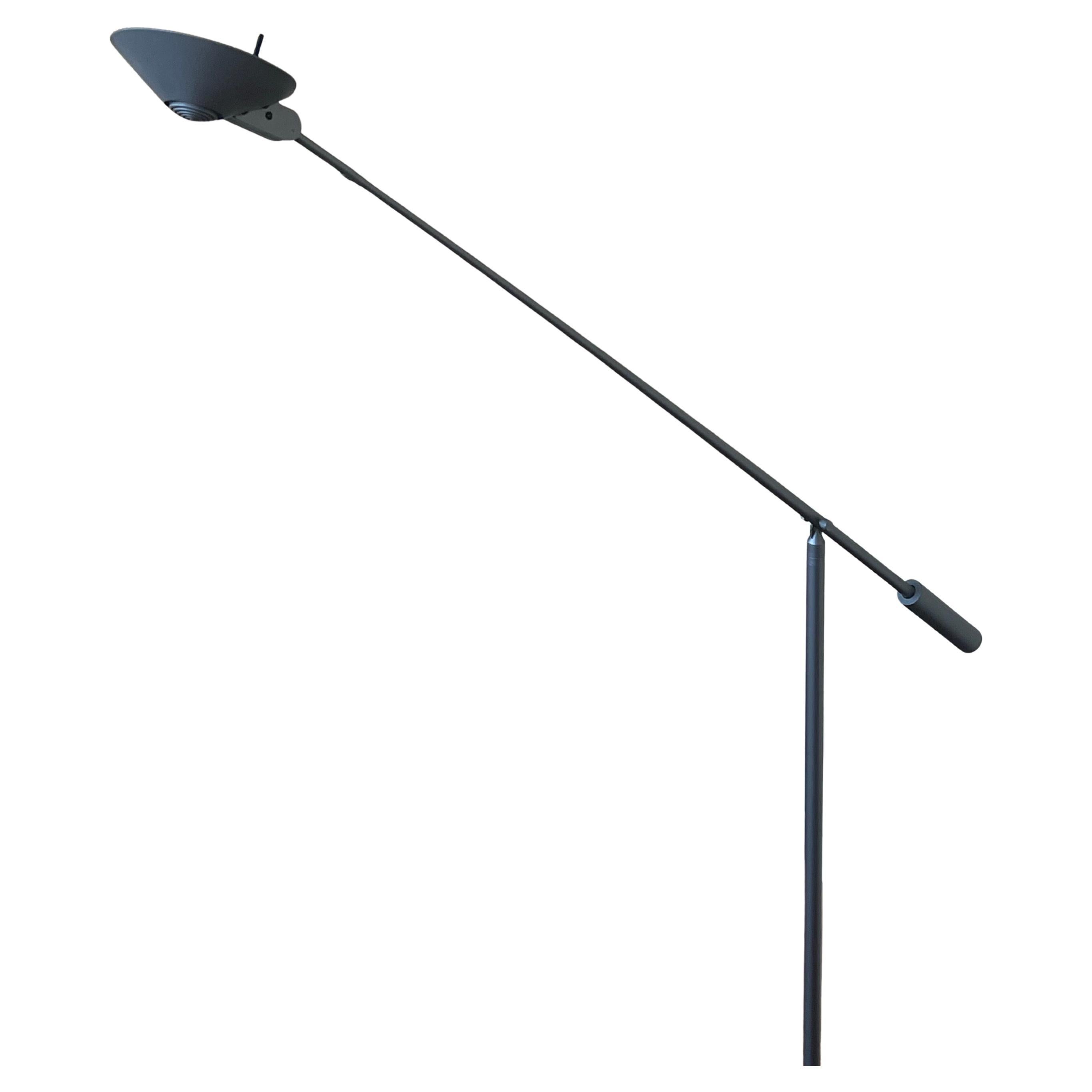 198's Multidirectional floor Lamp by Kovacs the lamp splits in 2 for easy shipping the shade rotates and the arm moves up and down , side to side .