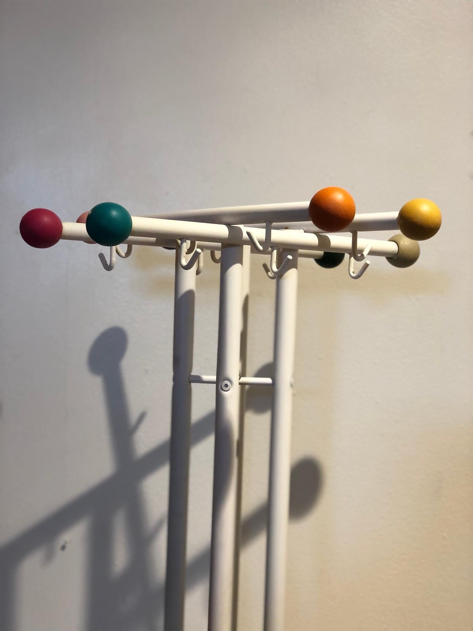 Very cool and simple design on this white metal pipping, and color wood painted balls circa 1980s good condition. I the style of Eames Designs.