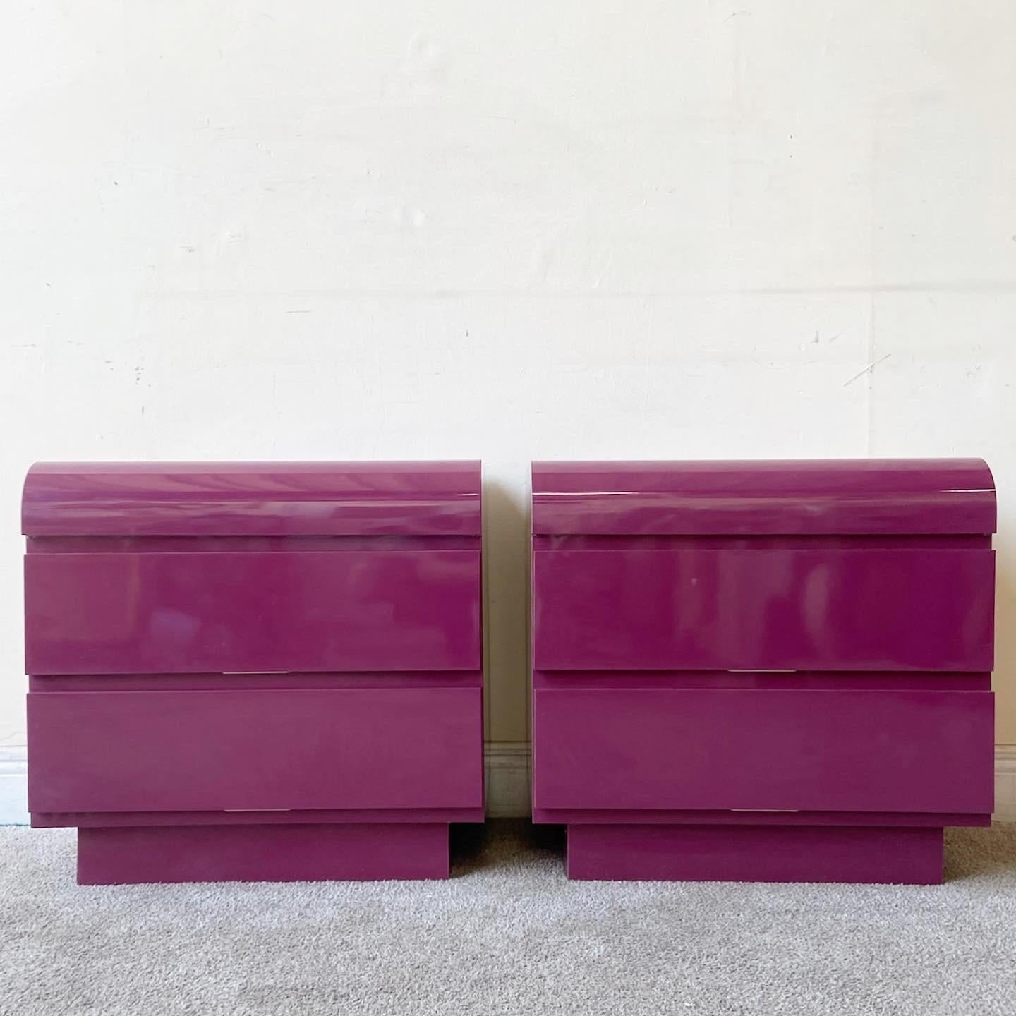 Exceptional postmodern waterfall nightstands. Each feature a purple lacquer laminate with two spacious drawers.
  
