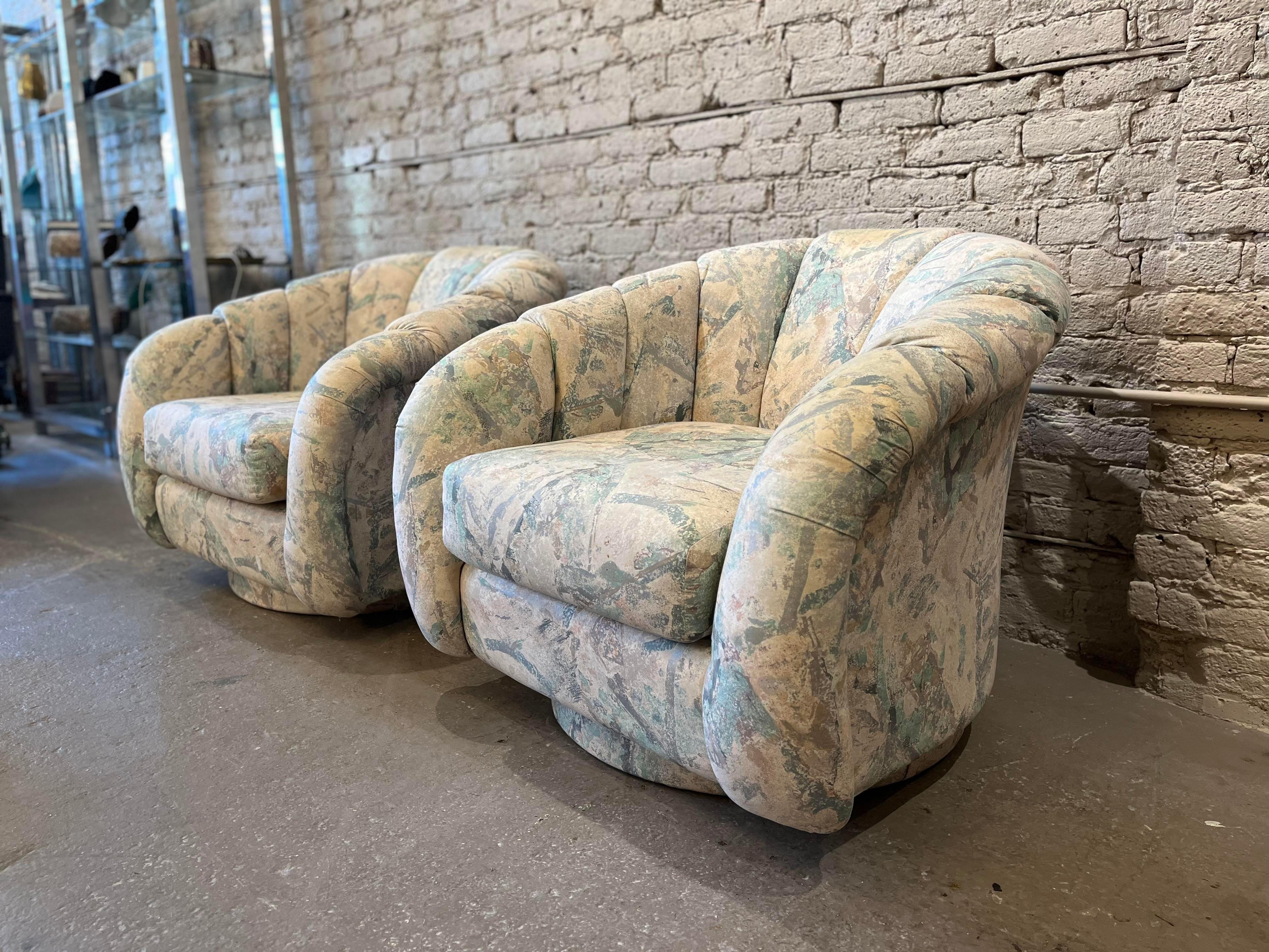 Lovely and comfortable swivel chairs with channeled backs. Use as is or redo in your favorite fabric. The cushions/structure/fabric are in great condition. 
