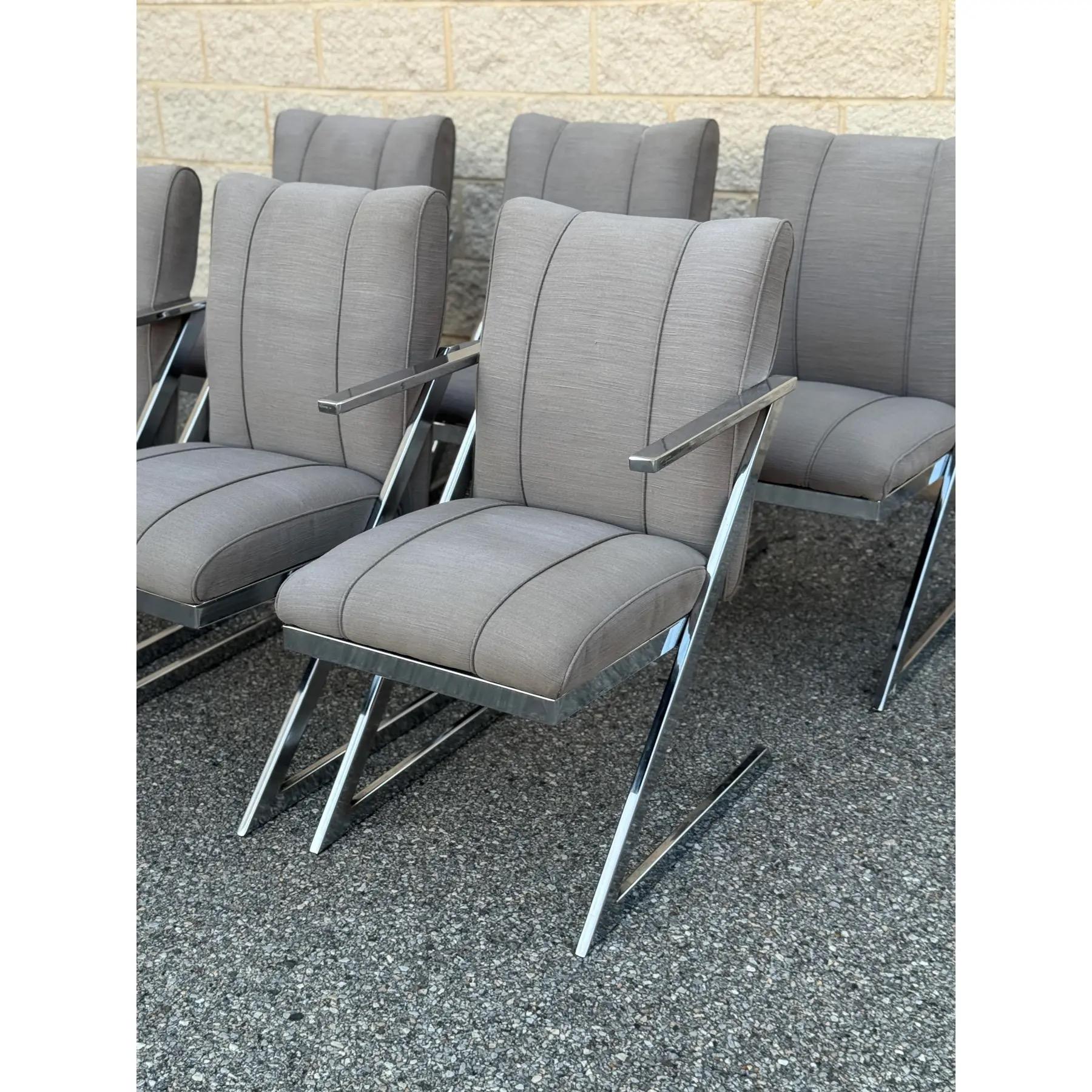 Set of six 1980s postmodern cantilever chairs showcases iconic design with bold upholstered seats and backs. Two chairs feature armrests.



