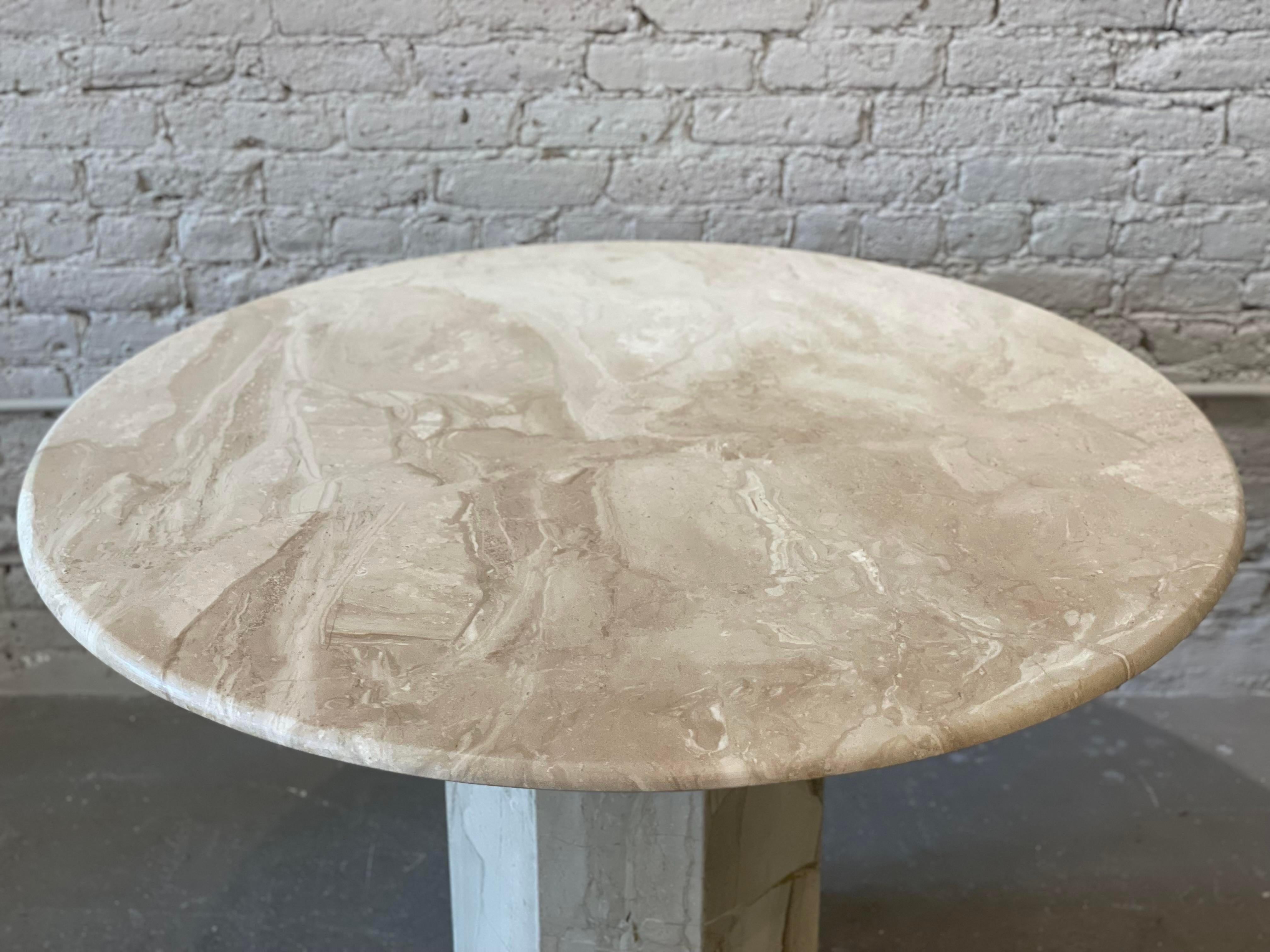 Love the veining on this little table which has been professionally honed, removing the dated lawyer to reveal an organic matte finish.

Perfect for dining for 4 or an entry table with gorgeous florals.