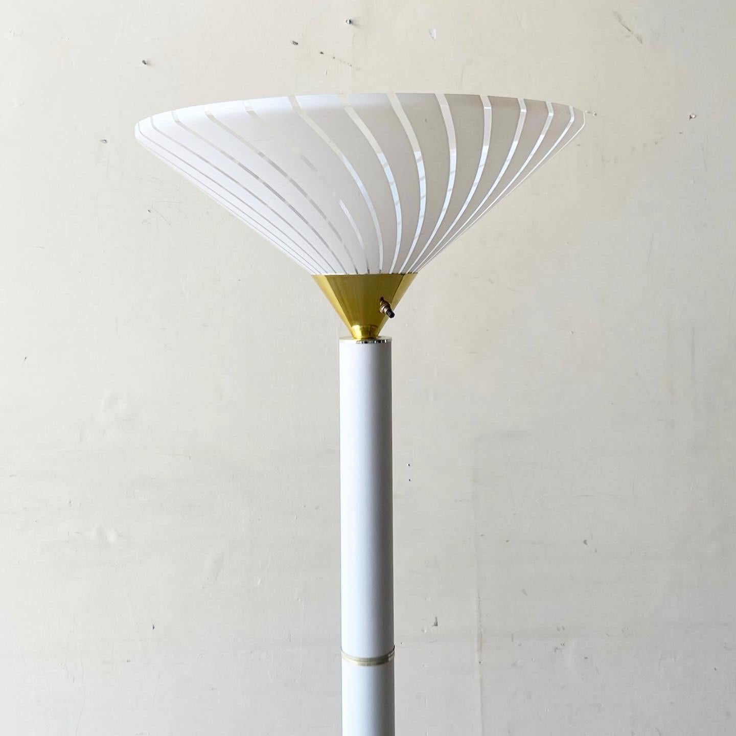 Incredible postmodern floor lamp. Body is white with a white striped lamp shade.