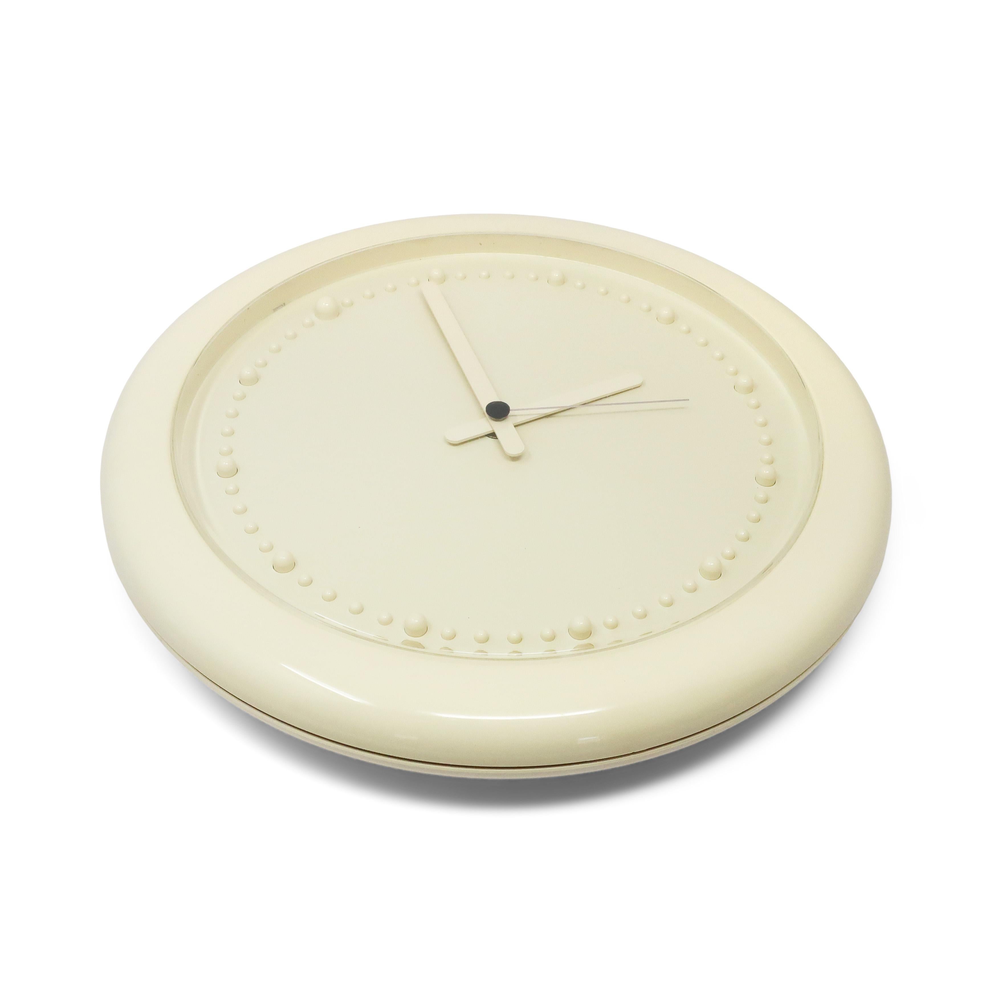 Designed by Raul Barbieri and Giorgio Marianelli for Rexite in 1981, this Zero 980 wall clock has a striking white on white colorway. White plastic case, white hands, and raised white plastic bumps for the clock's numbers and a white face. Perfect