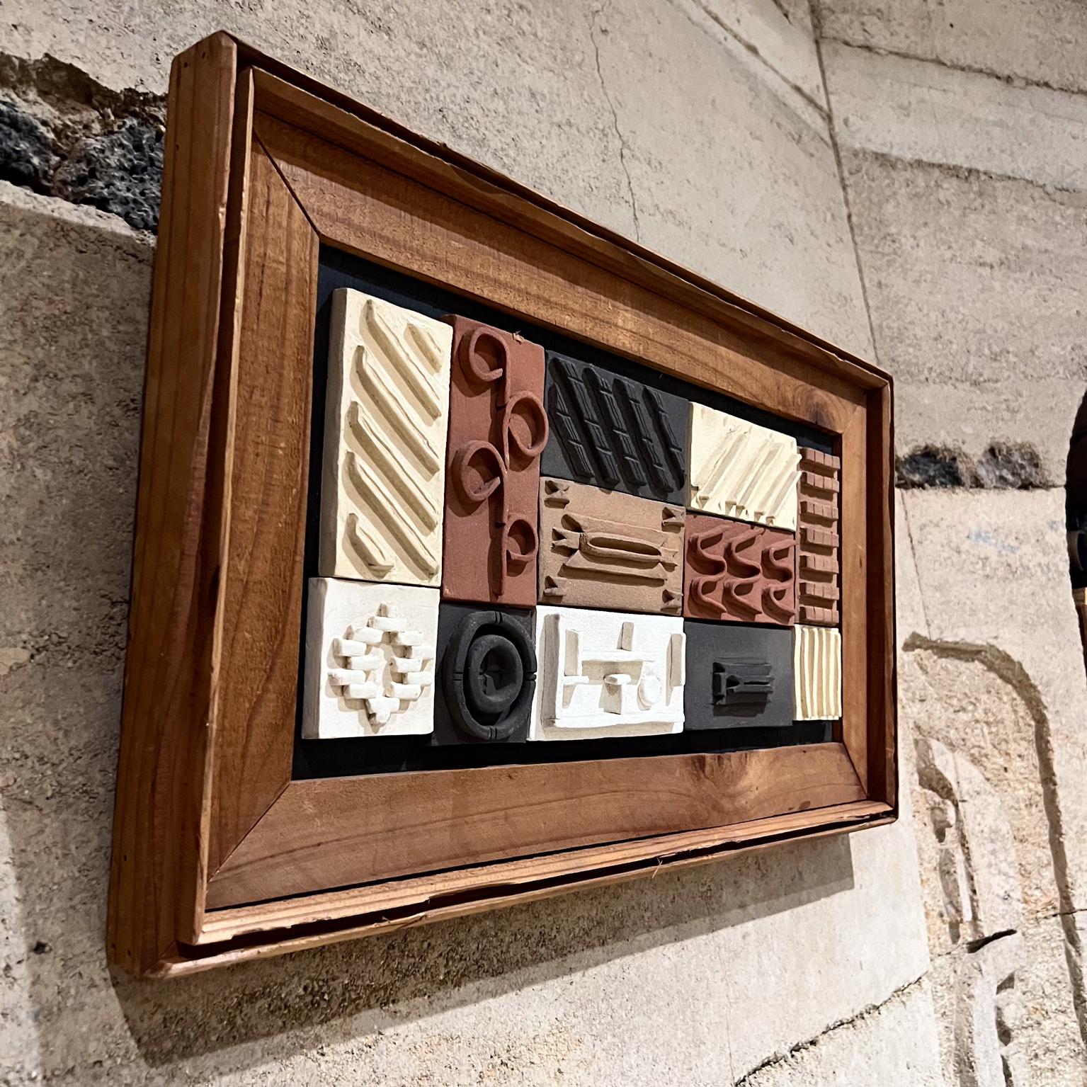 AMBIANIC presents
1980s Wall Art Wood Framed Modern Pottery Geometric Design Tiles
24.75 x 14 tall Art 18.75 x 8.25
Original vintage condition.
Refer to images provided.