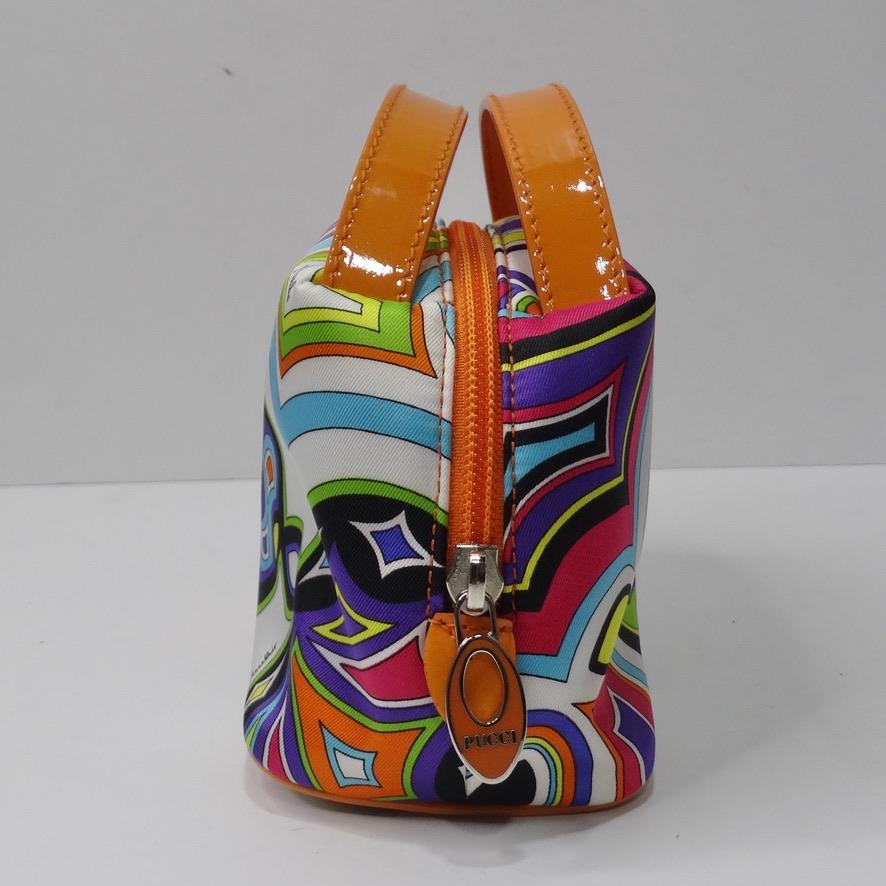Stunning Emilio Pucci silk mini bag circa 1980s in pristine condition. Emilio Pucci presents his take on the micro hand bag with this gorgeous bucket style purse in a signature Emilio Pucci  kaleidoscopic print. The colors on this bag are so vibrant